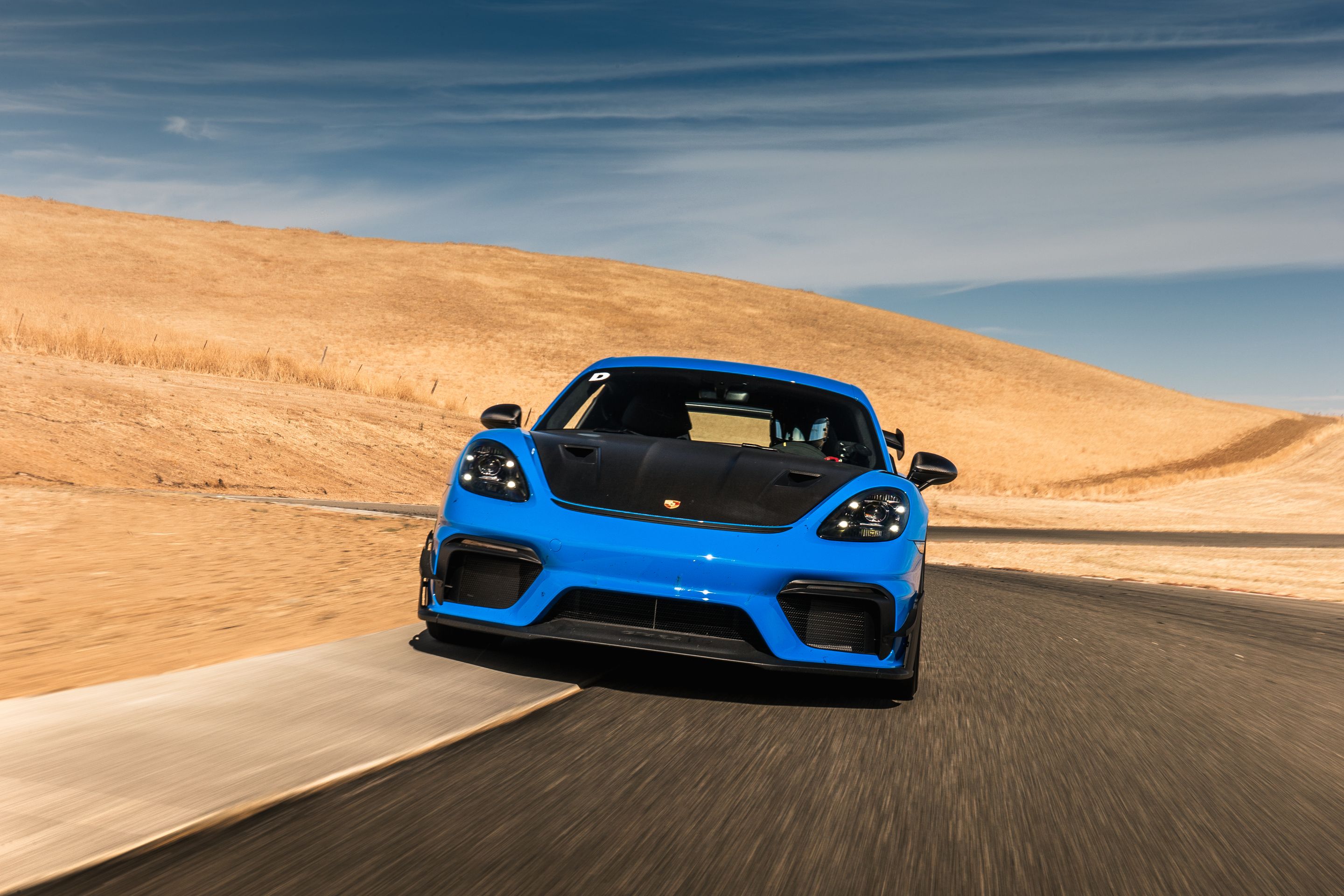 Blue Porsche 718 Cayman GT4 RS with 19" EC-7RS Apex wheels in Race Silver