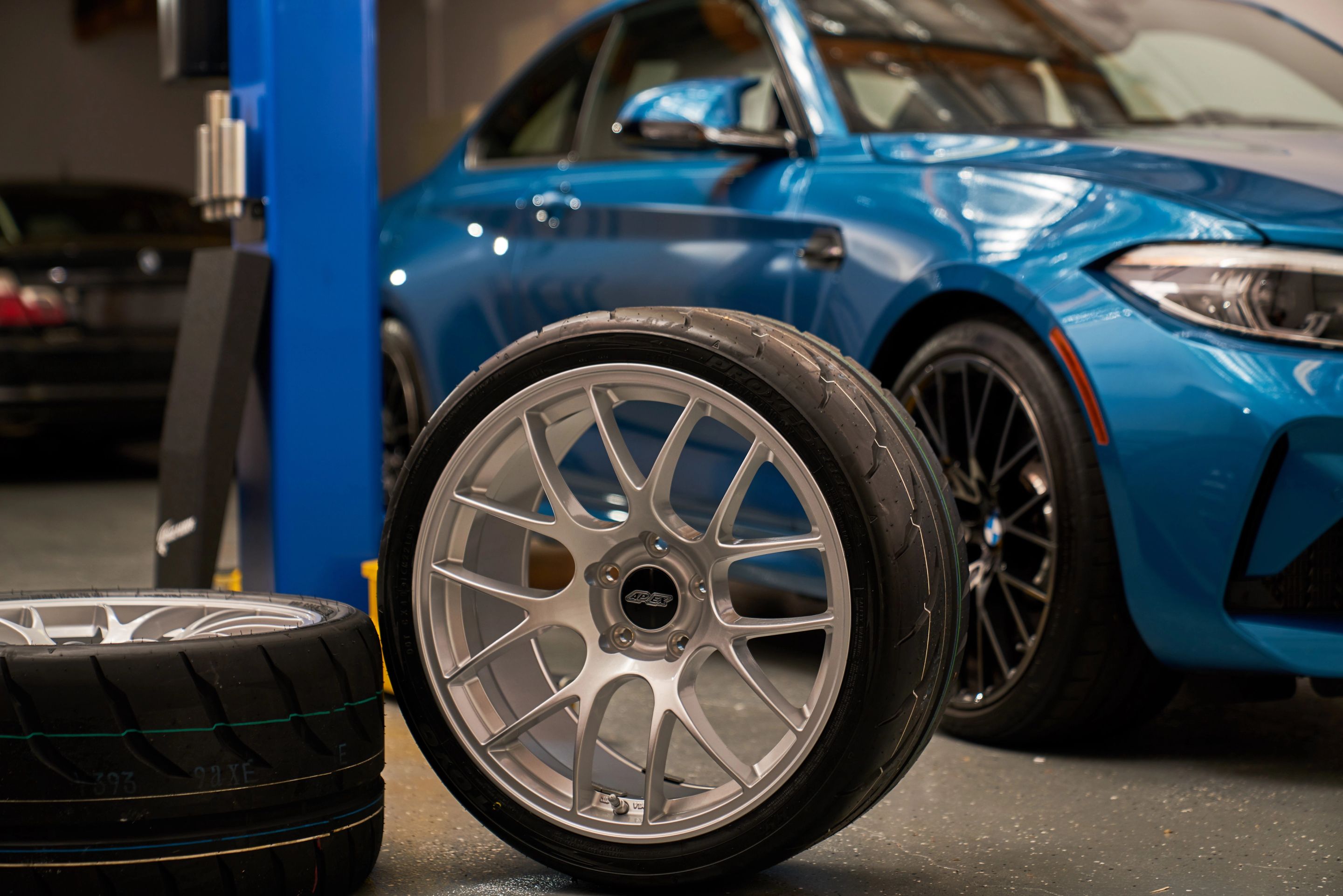 Blue BMW F87 M2 with 19" EC-7 Apex wheels in Race Silver