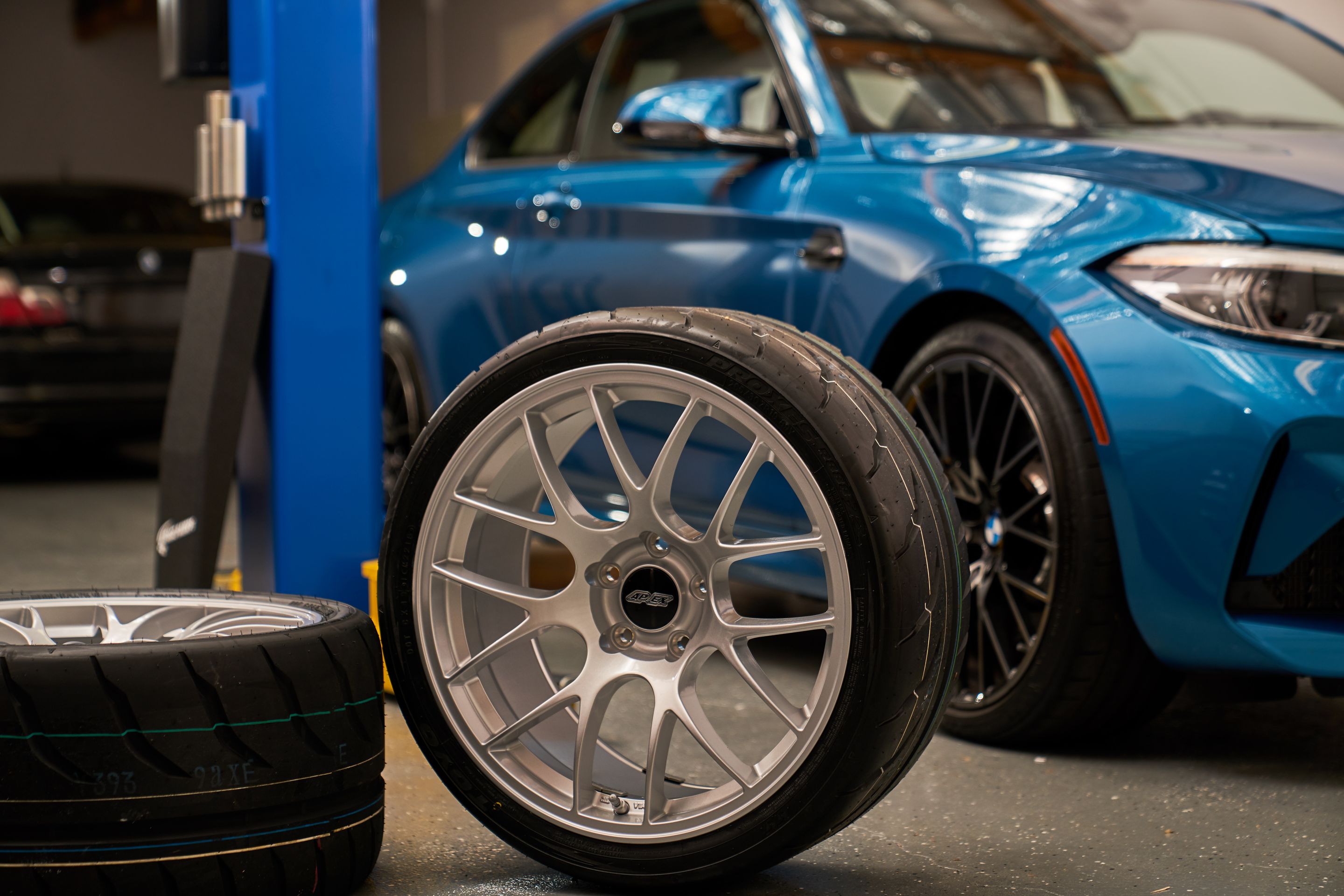 Blue BMW F87 M2 with 19" EC-7 Apex wheels in Race Silver