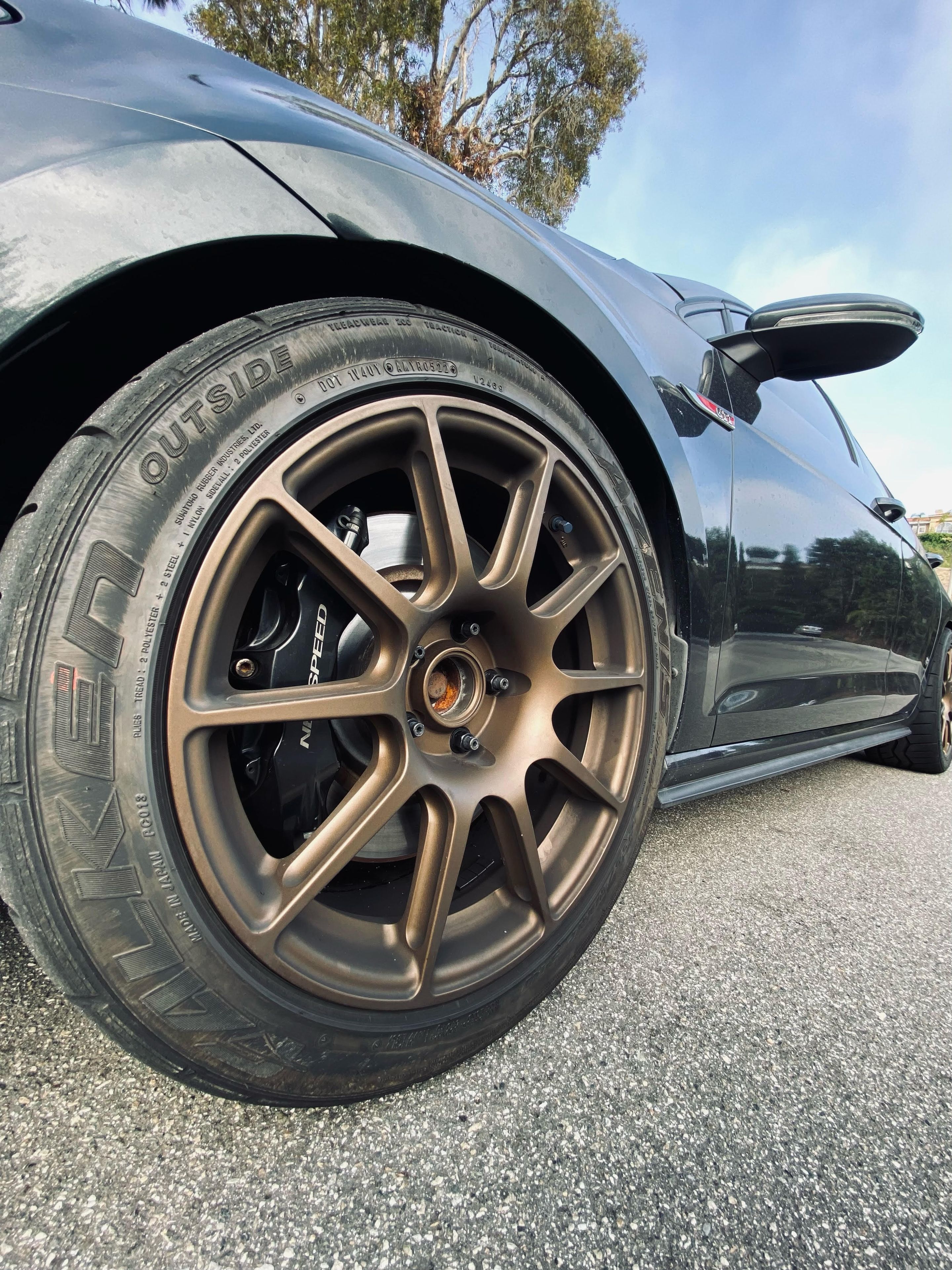 Grey VW MK7 GTI with 17" SM-10 Apex wheels in Satin Bronze