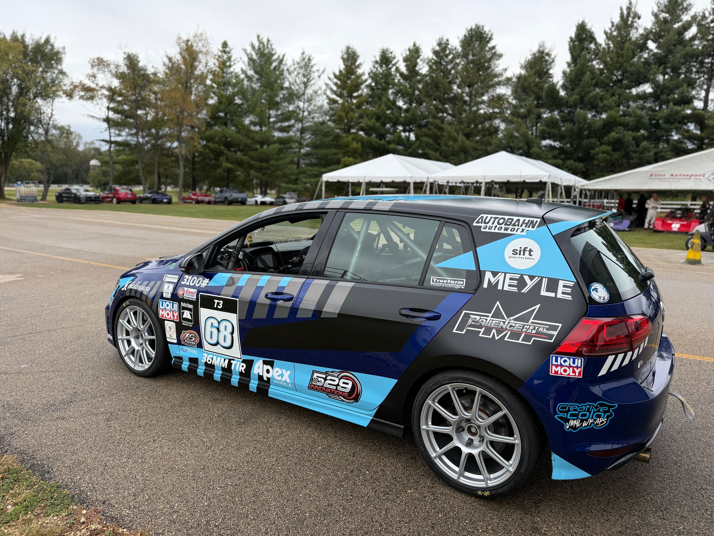 Race Livery VW MK7 Golf R with 18" SM-10 Apex wheels in Race Silver