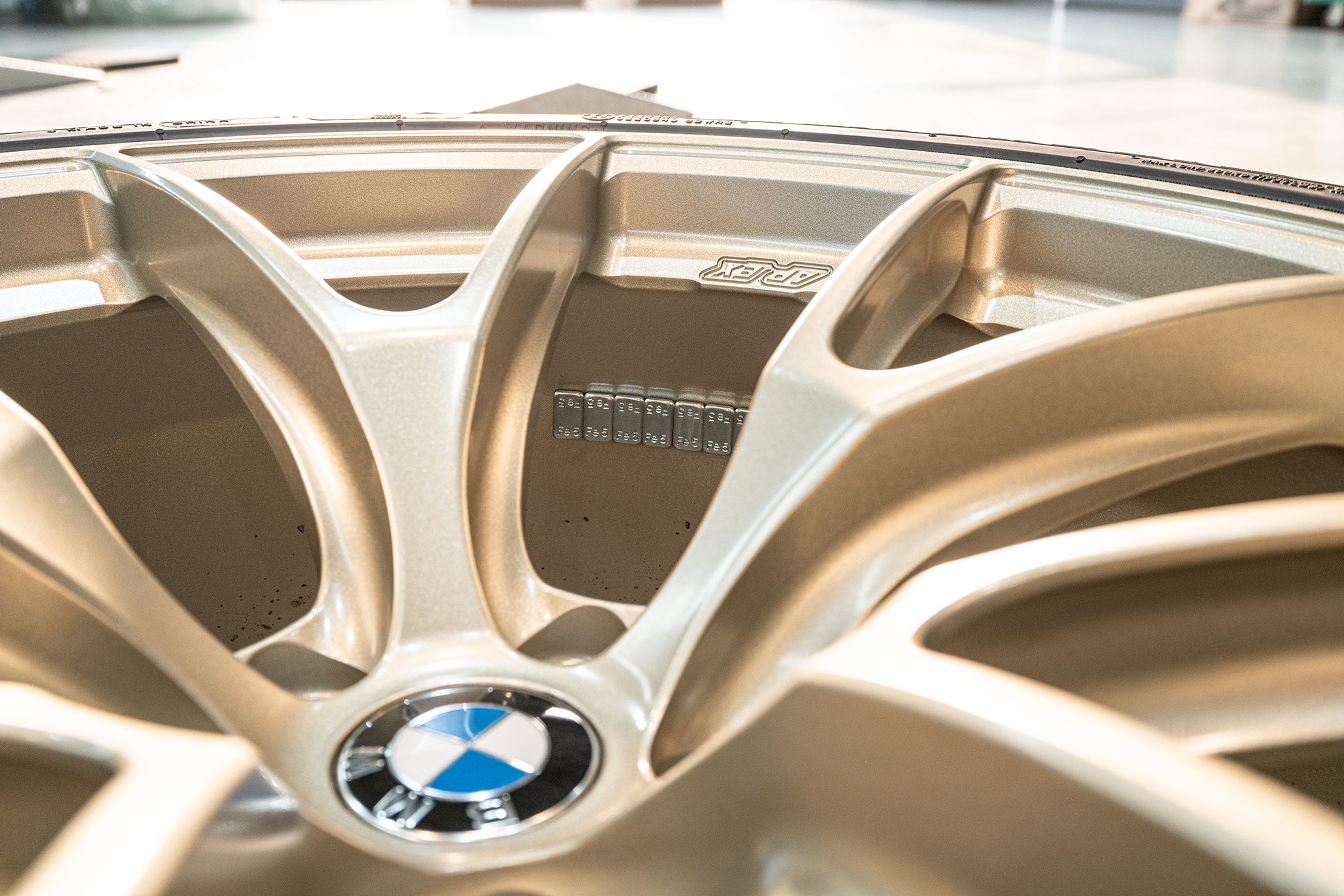 Black BMW G87 M2 with 19" VS-5RS Apex wheels in Motorsport Gold