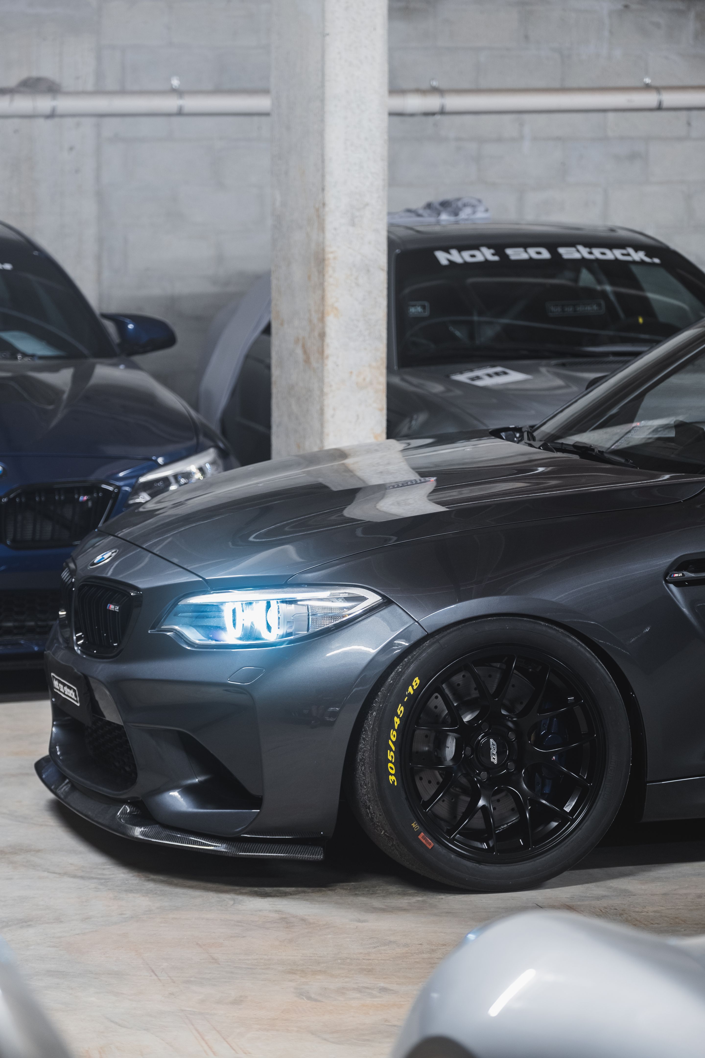 Black BMW F87 M2 with 18" EC-7 Apex wheels in Satin Black