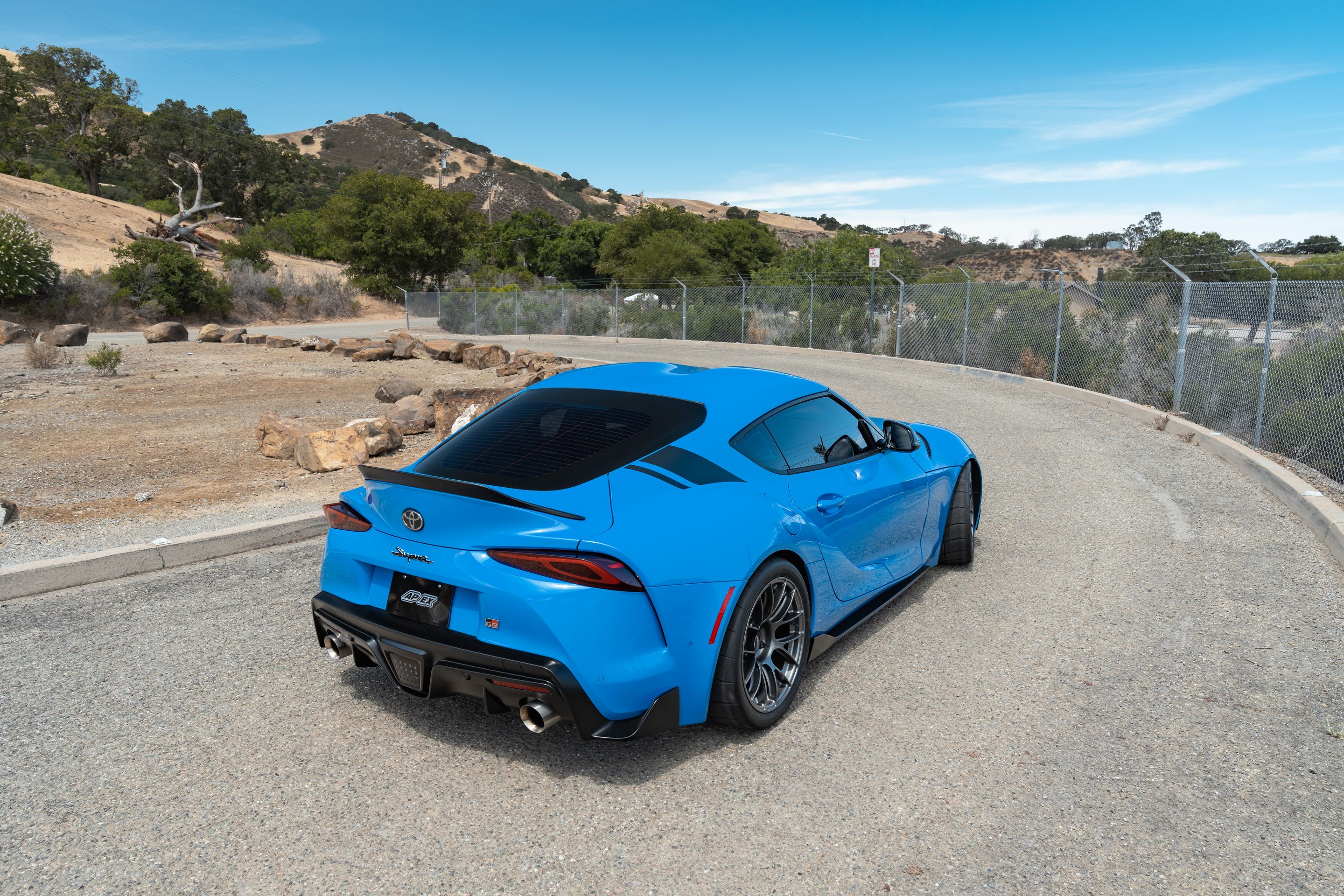 Blue Toyota GR Supra with 18" EC-7RS Apex wheels in Anthracite