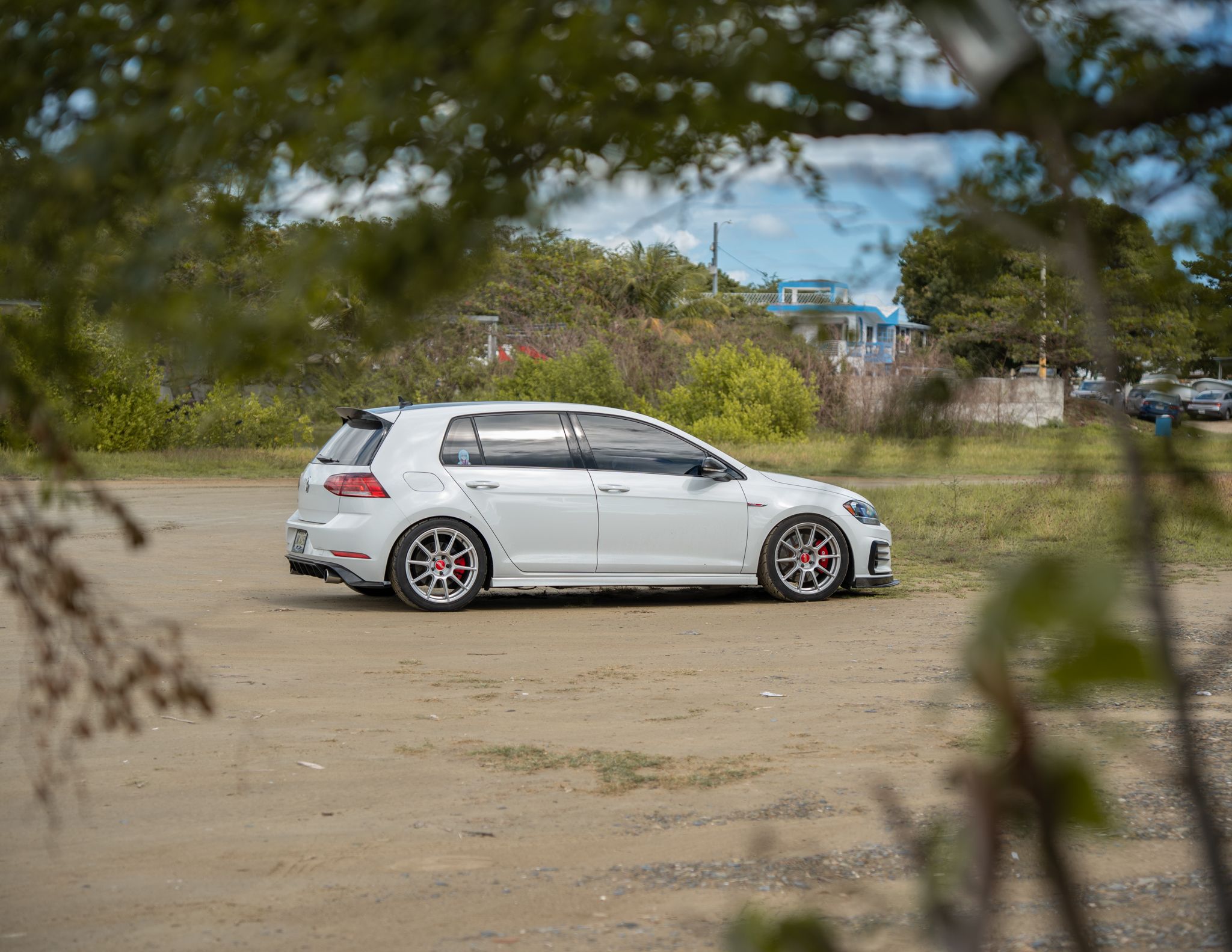 White VW MK7 GTI with 18" SM-10 Apex wheels in Race Silver