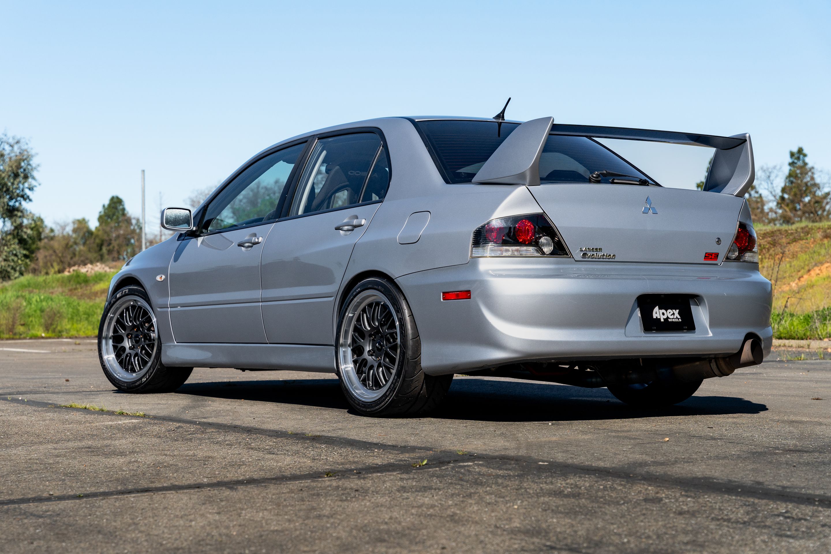 Silver Mitsubishi Lancer Evolution IX with 18" ML-10RT Apex wheels in Machined Lip Anthracite