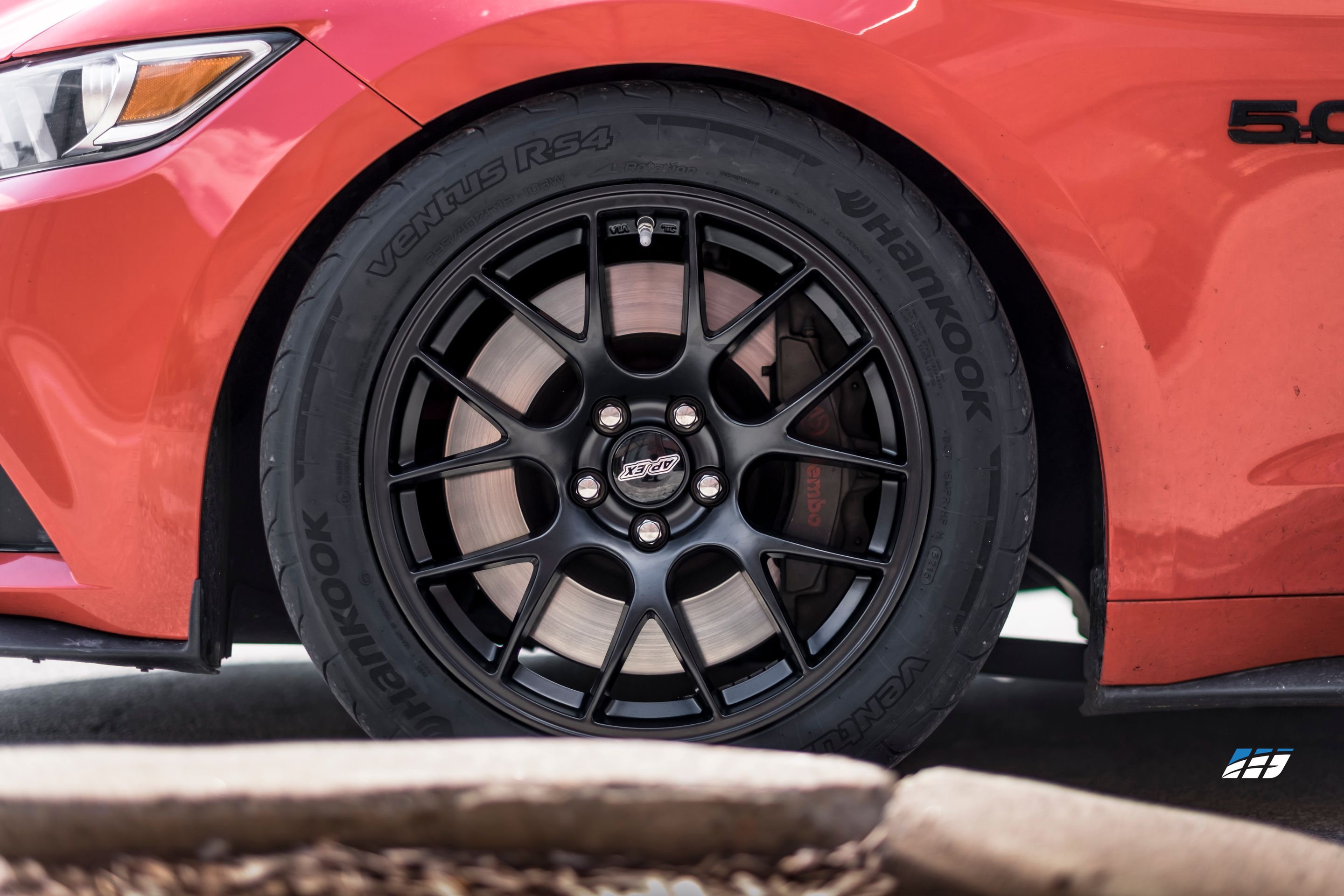Red Ford S550 Mustang GT with 18" EC-7 Apex wheels in Satin Black
