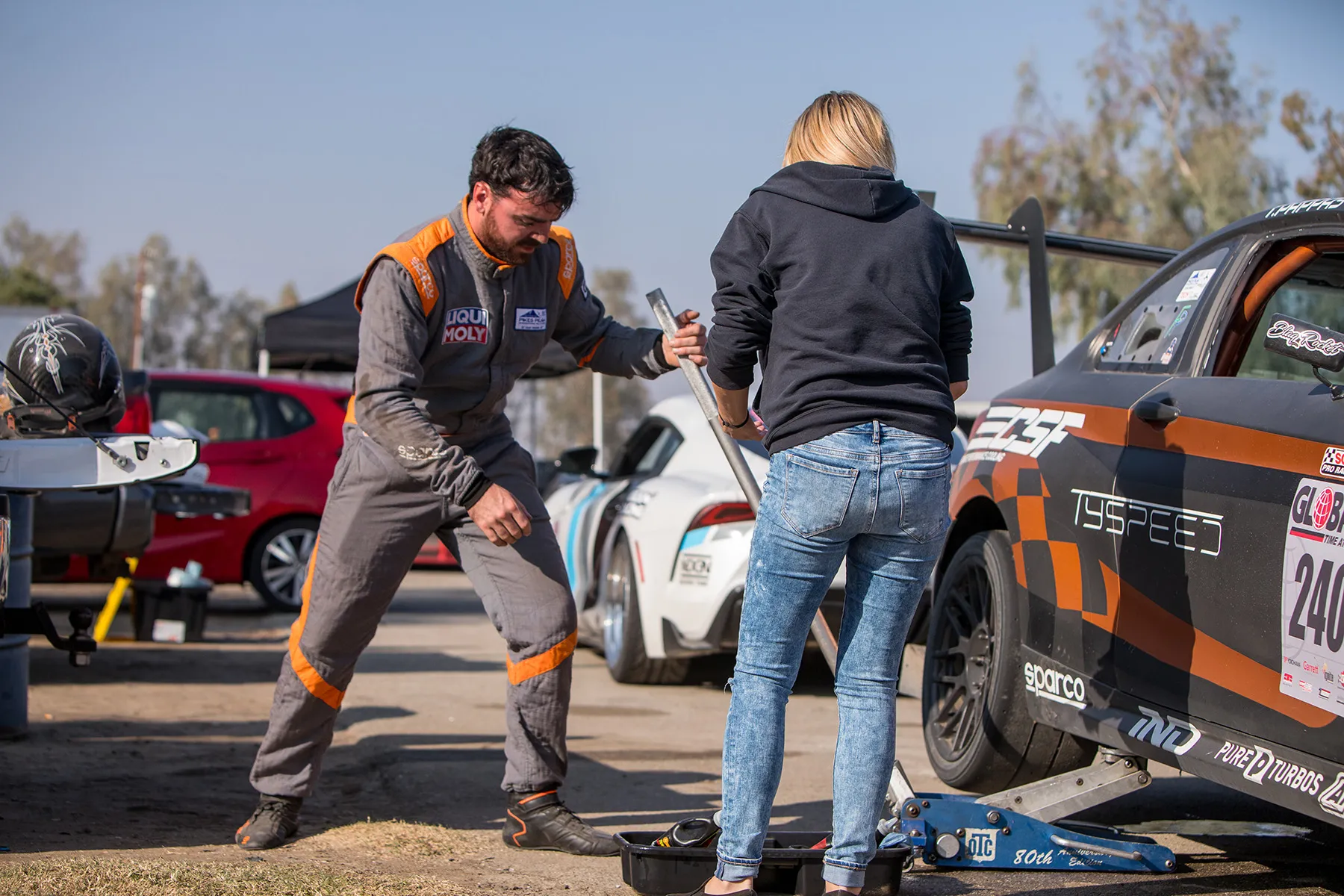 Multicolor BMW F87 M2 with 18" ARC-8R Apex wheels in Satin Black
