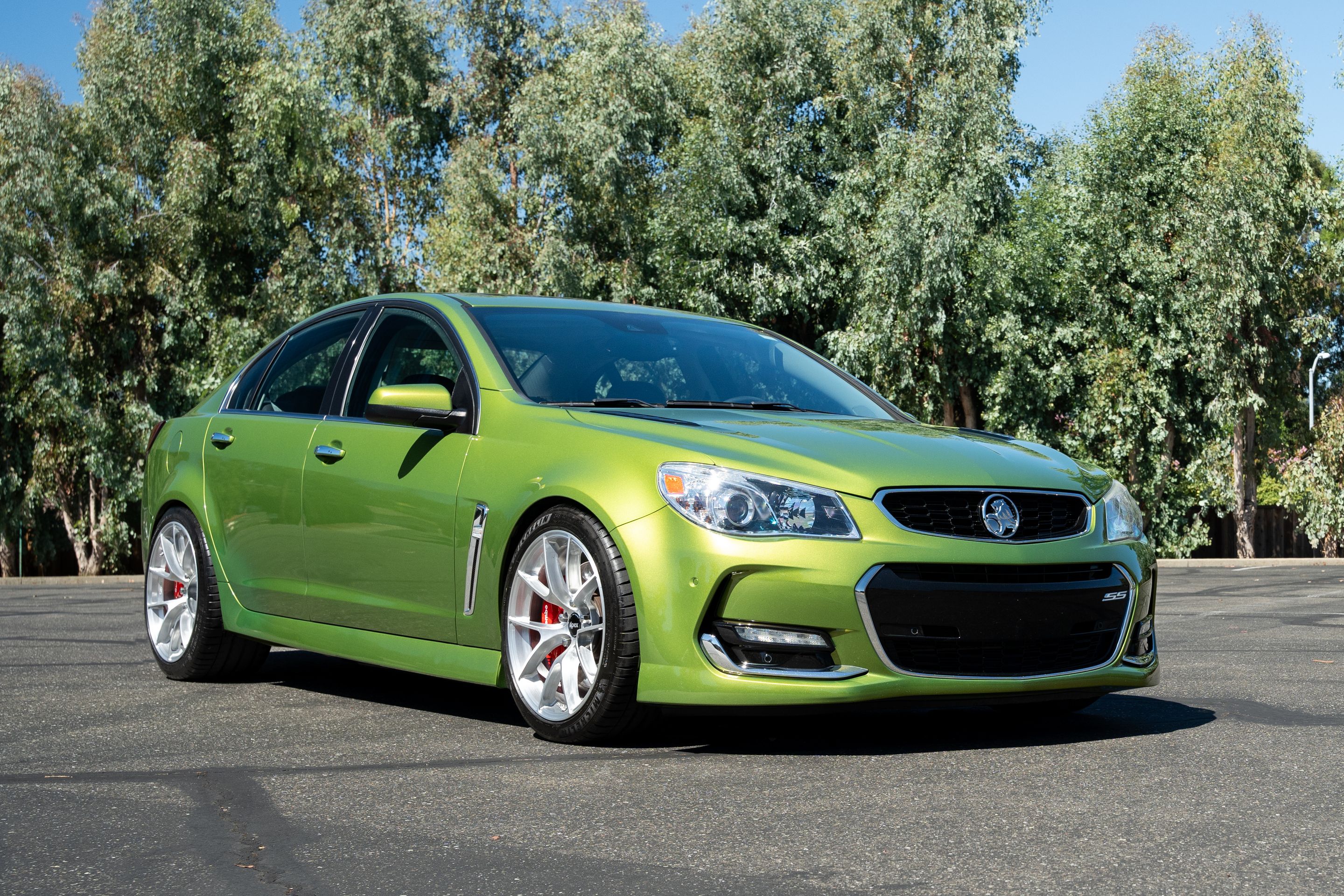 Green Chevrolet SS with 19" VS-5RS Apex wheels in Brushed Clear