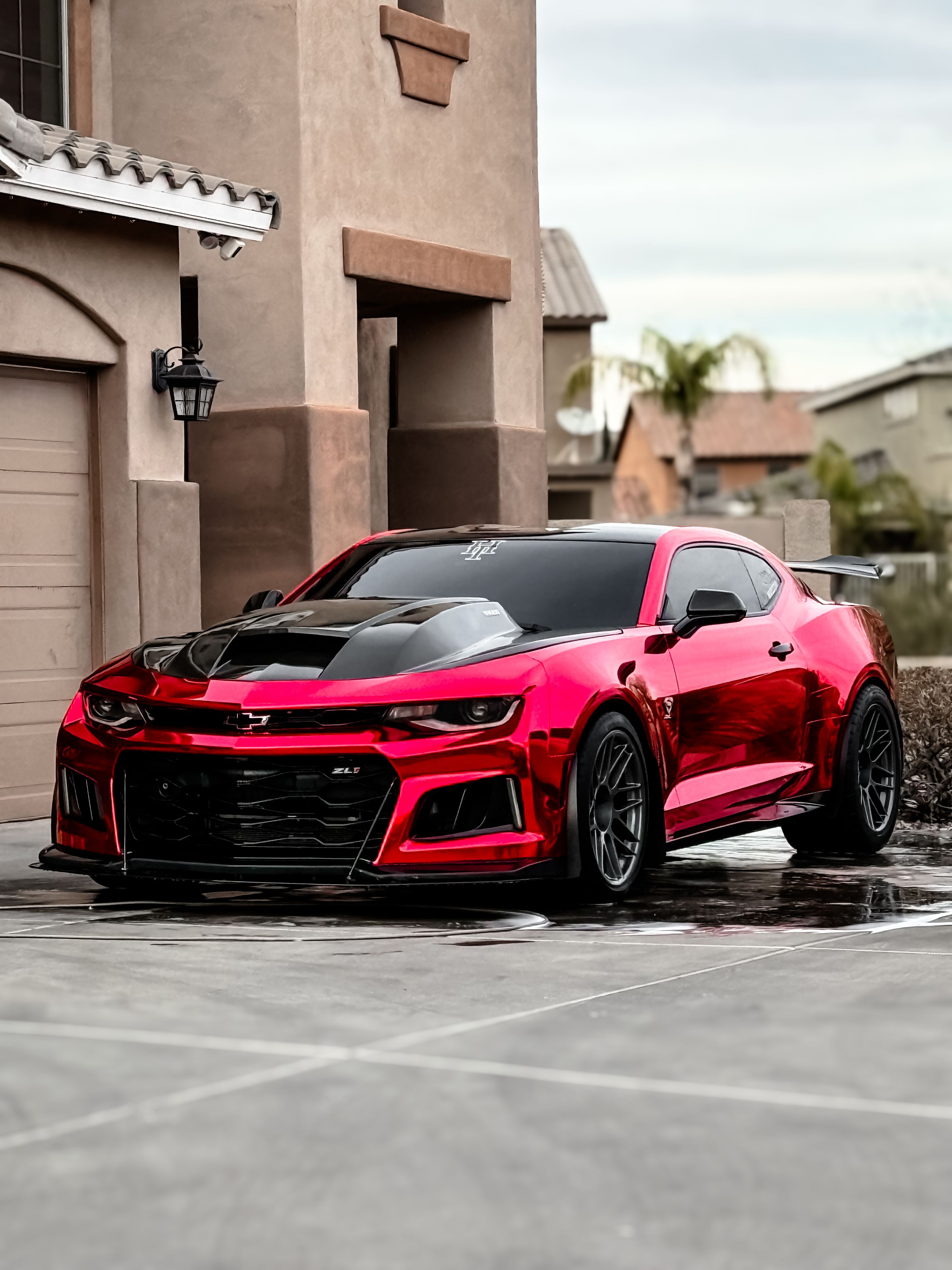 Red Chevrolet 6th Gen Camaro ZL1 with 19" ARC-8 Apex wheels in Anthracite