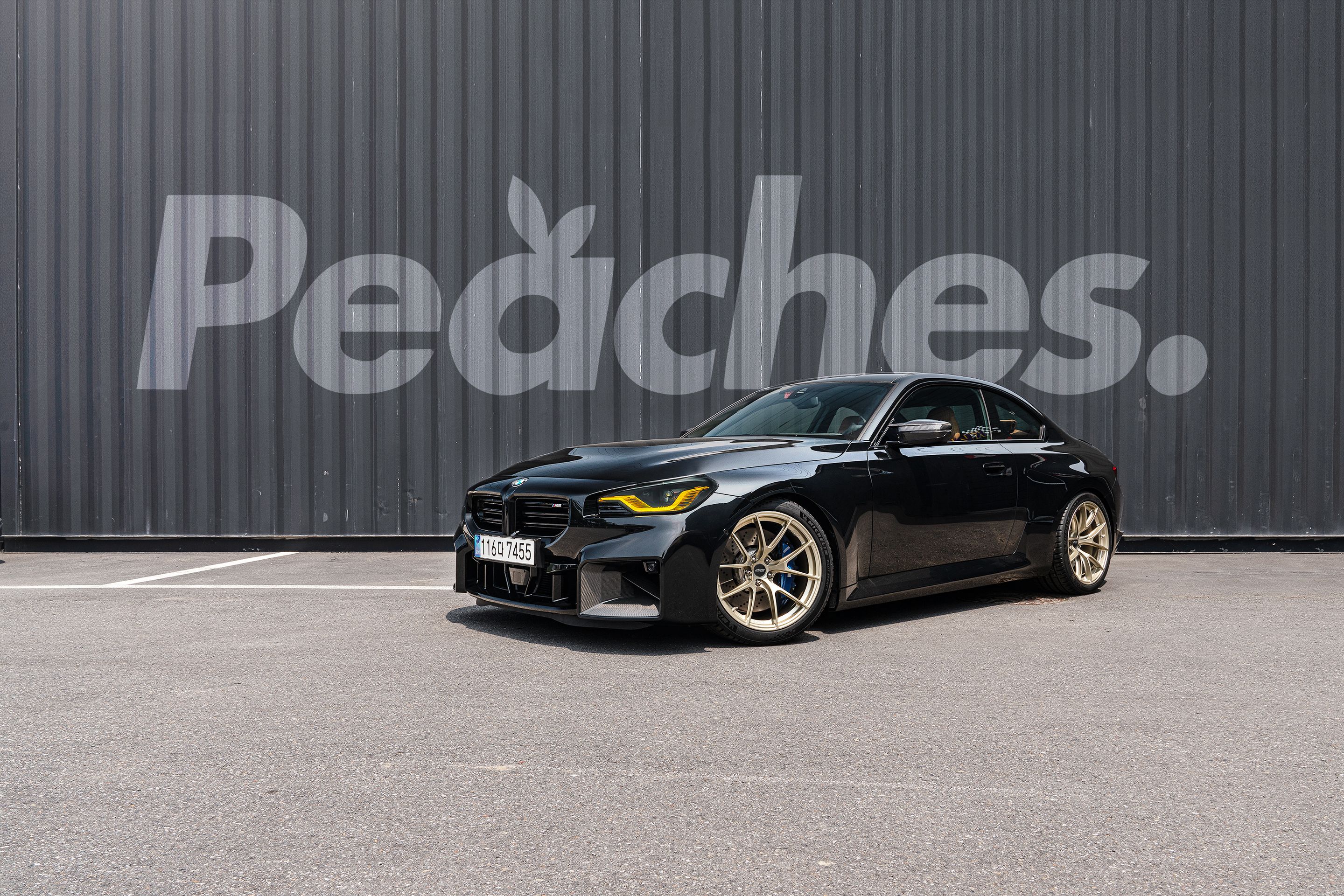 Black BMW G87 M2 with 19" VS-5RS Apex wheels in Motorsport Gold
