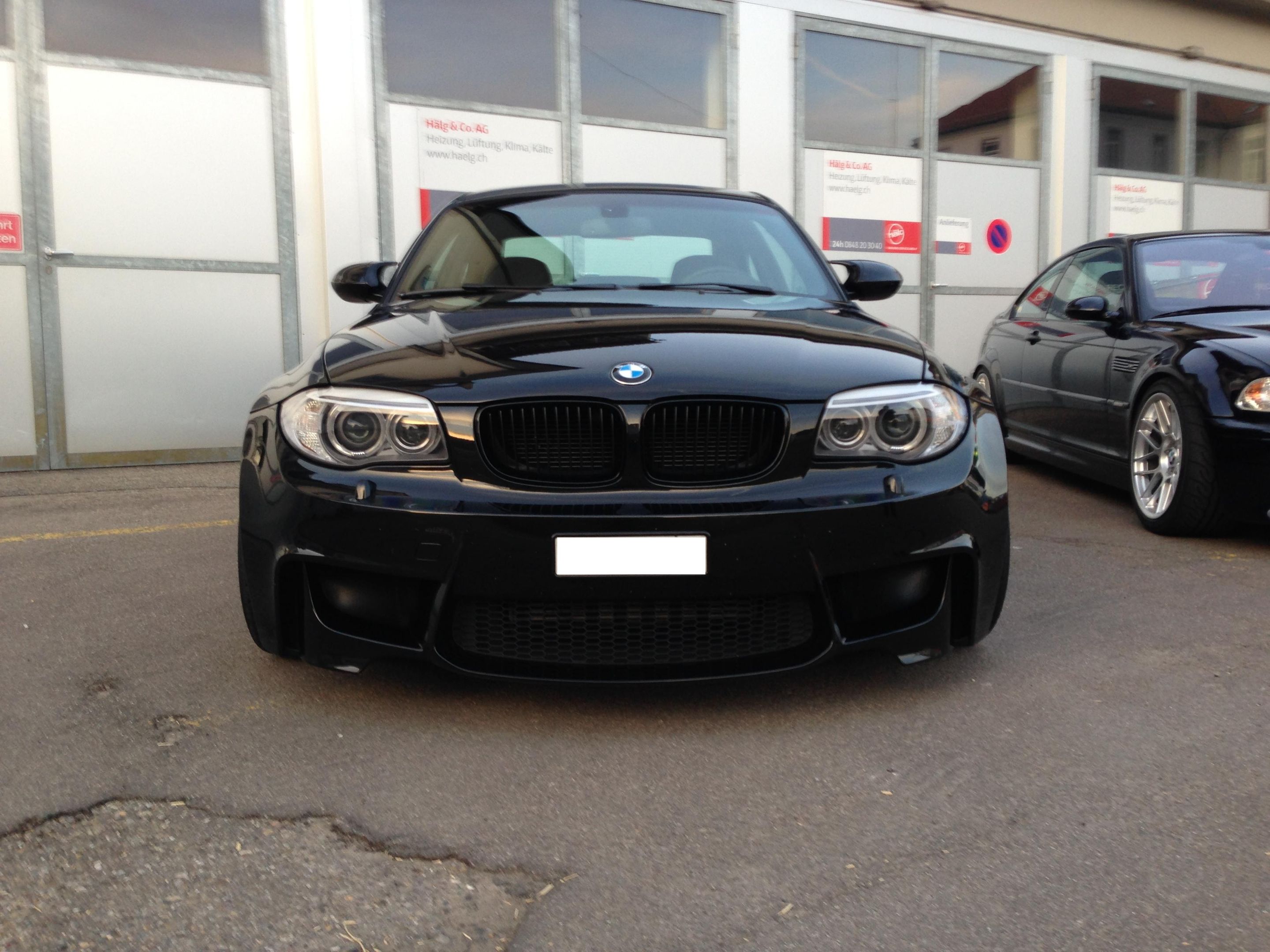 Black BMW E82 1M with 18" ARC-8 Apex wheels in Anthracite