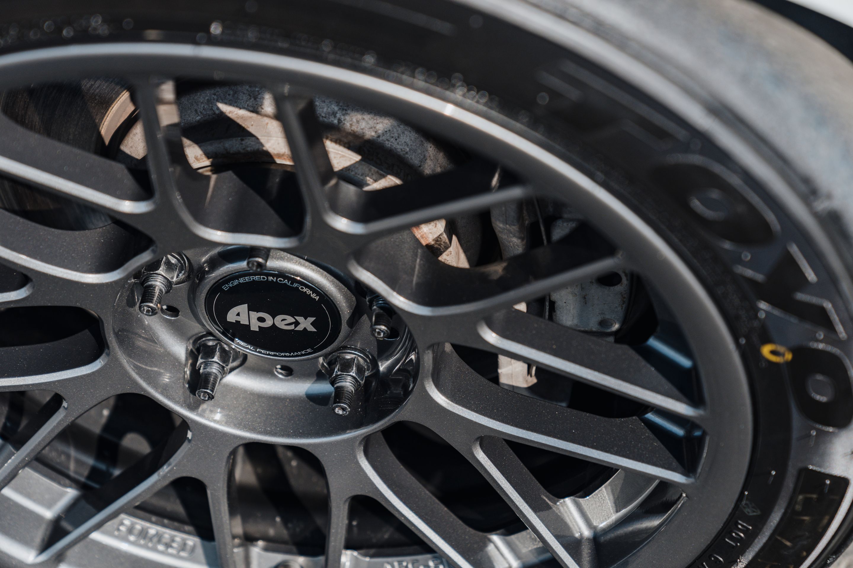 White BMW E90 LCI Sedan 3 Series with 17" ARC-8RT Apex wheels in Anthracite