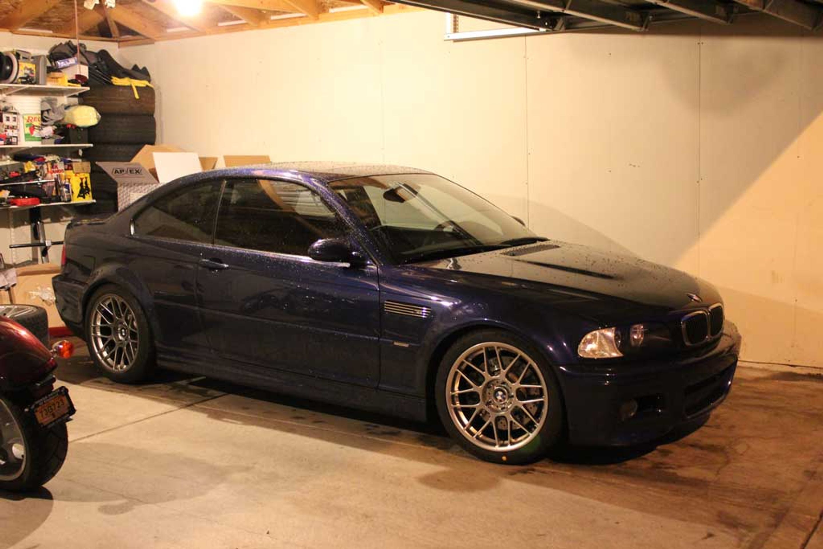 Blue BMW E46 M3 with 18" ARC-8 Apex wheels in Hyper Black