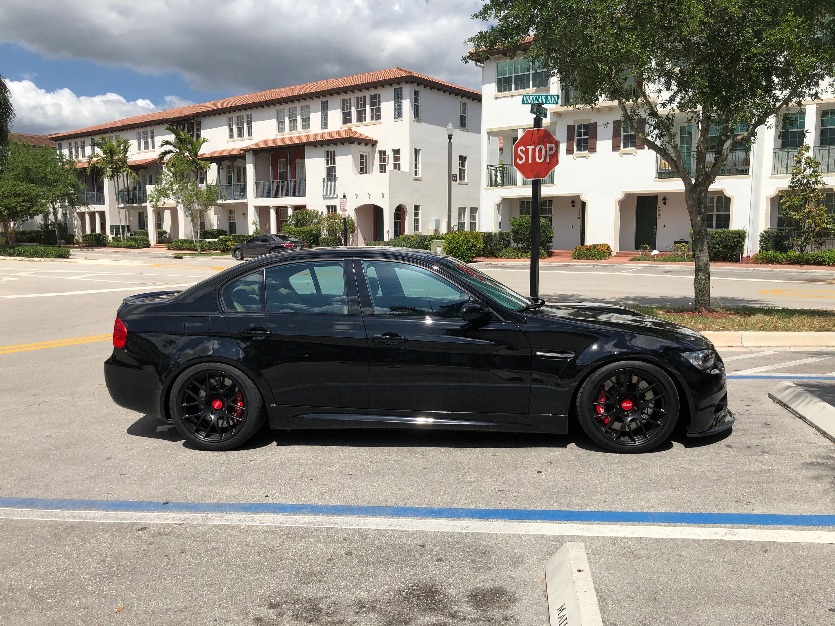 Black BMW E90 Sedan M3 with 18" EC-7R Apex wheels in Satin Black