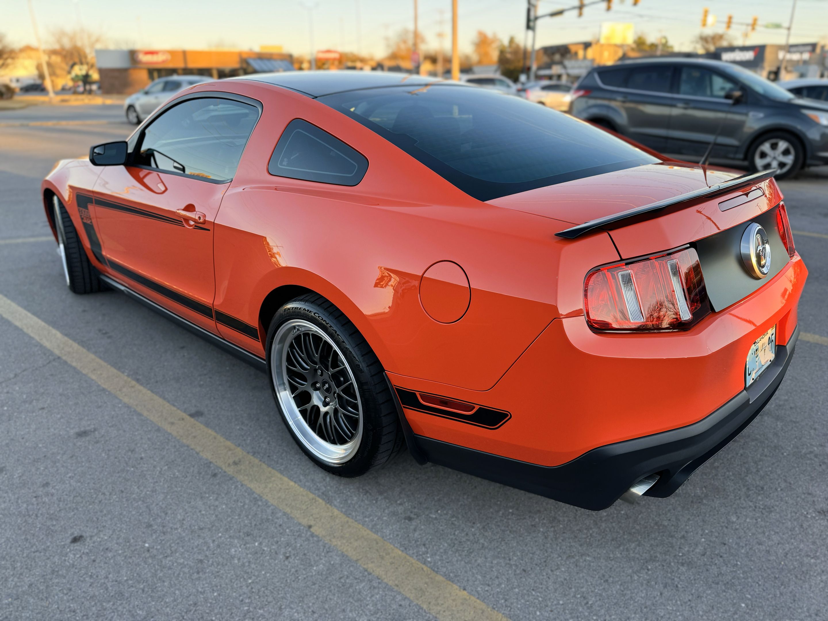 Orange Ford S197 Mustang Boss 302 with 19" ML-10RT Apex wheels in Machined Lip Anthracite