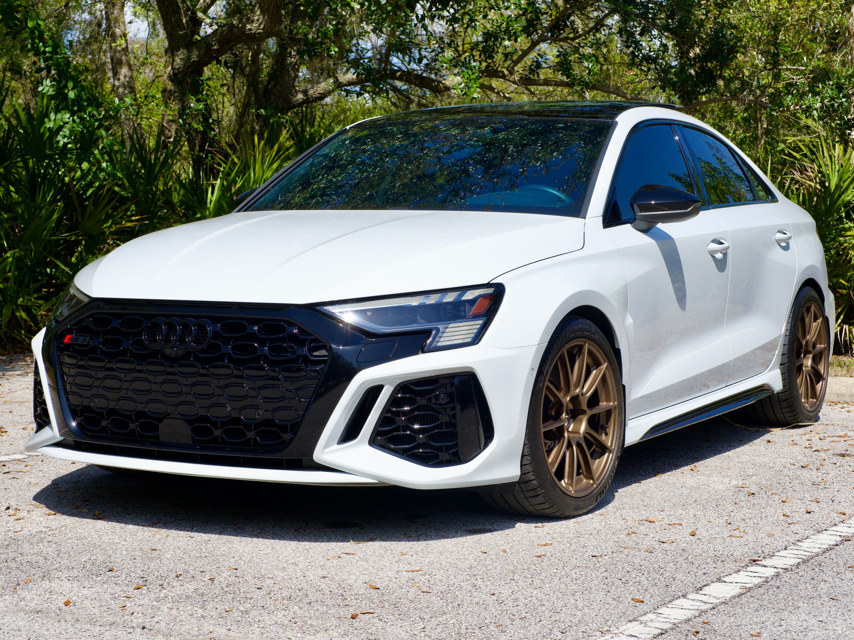 White Audi 8Y RS 3 with 18" SM-10RS Apex wheels in Satin Bronze