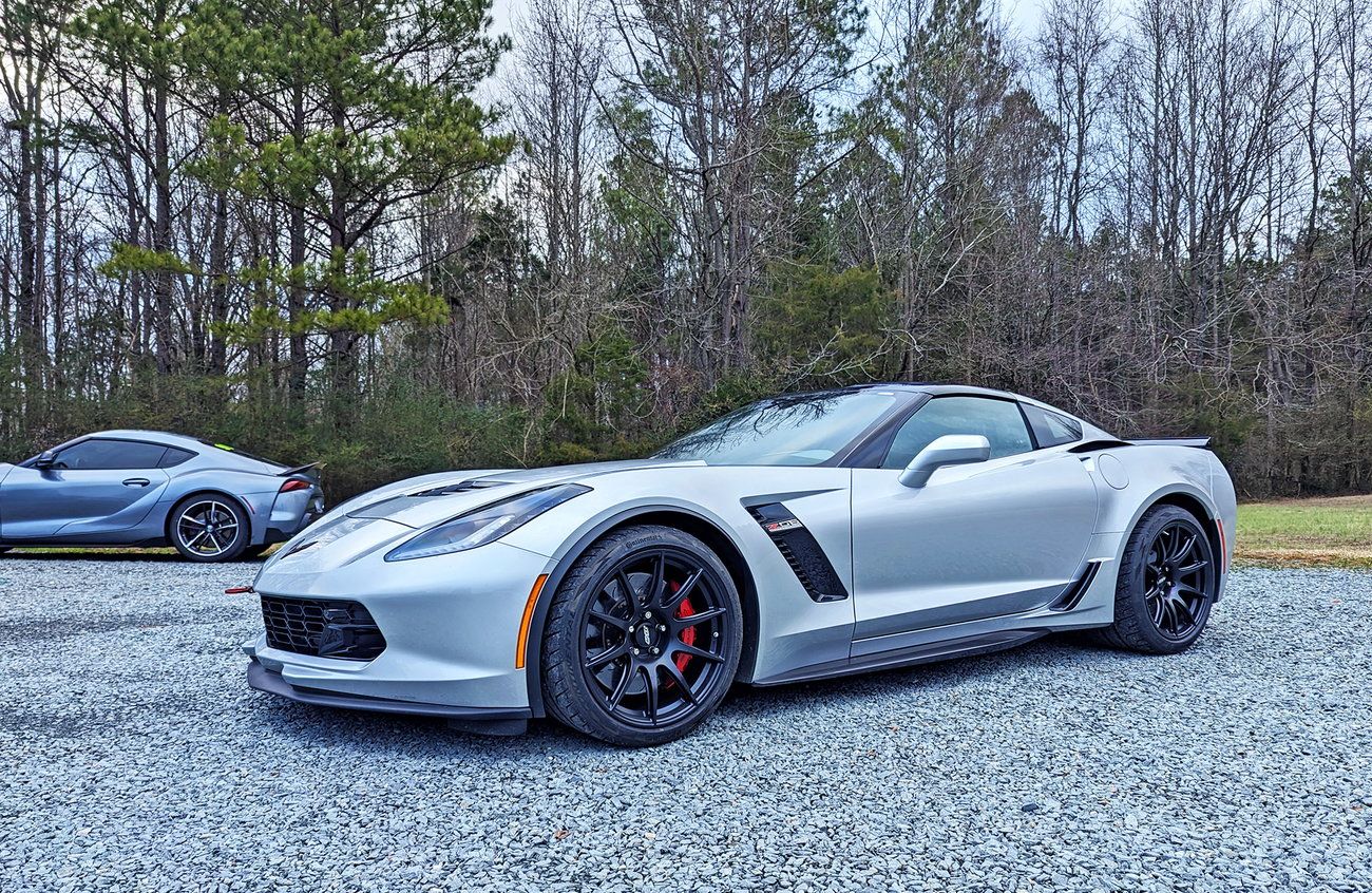 Silver Chevrolet C7 Corvette Z06 with 19" SM-10 Apex wheels in Satin Black