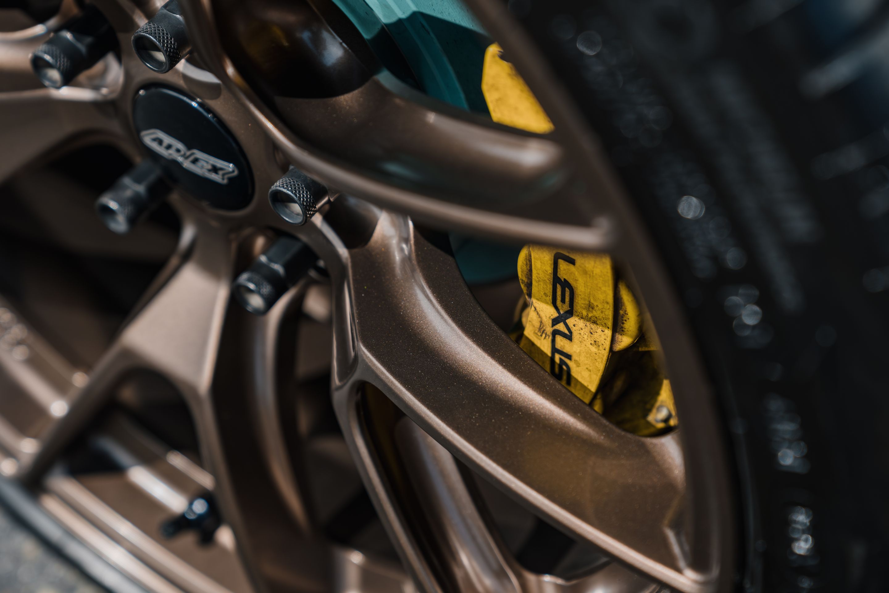 Red Lexus USE20 IS-F with 18" VS-5RS Apex wheels in Satin Bronze