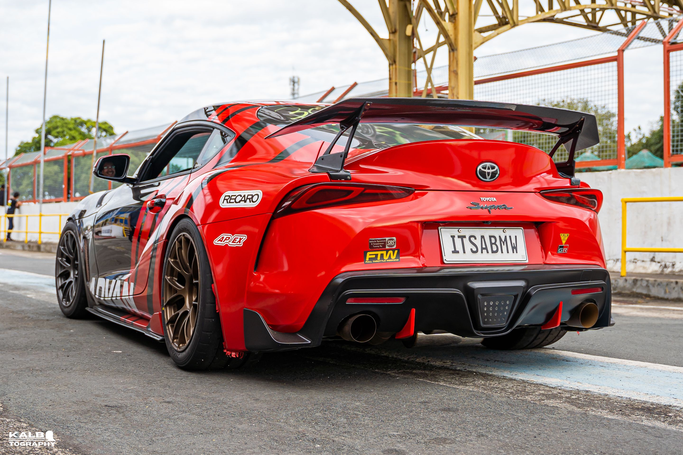 Black Toyota GR Supra with 18" EC-7RS Apex wheels in Satin Bronze