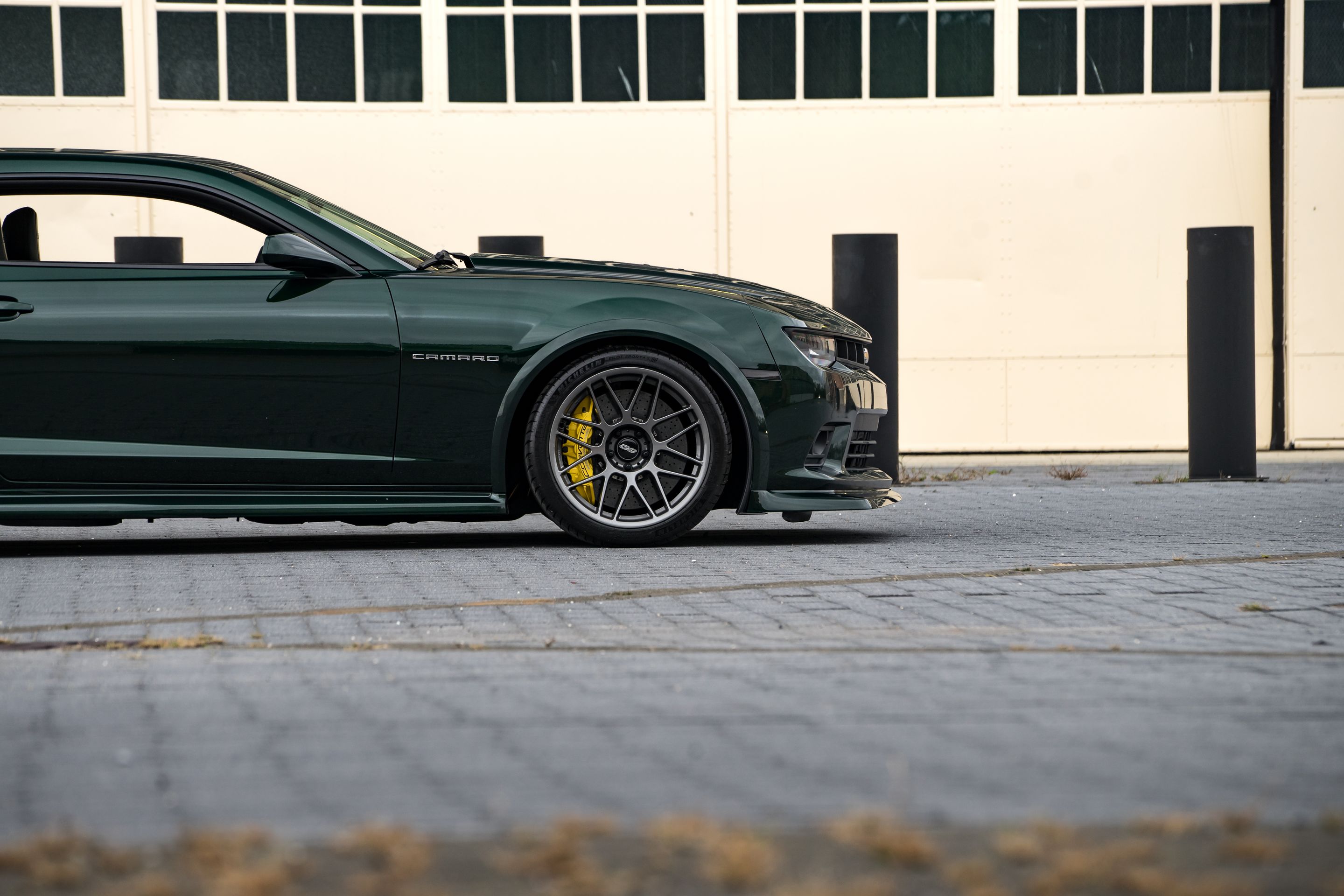 Green Chevrolet 5th Gen Camaro SS with 19" ARC-8 Apex wheels in Anthracite