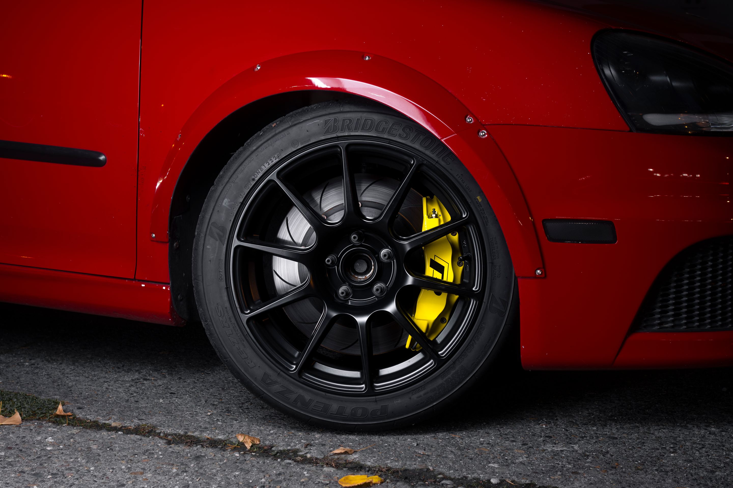 Red VW MK5 Golf with 17" SM-10 Apex wheels in Satin Black