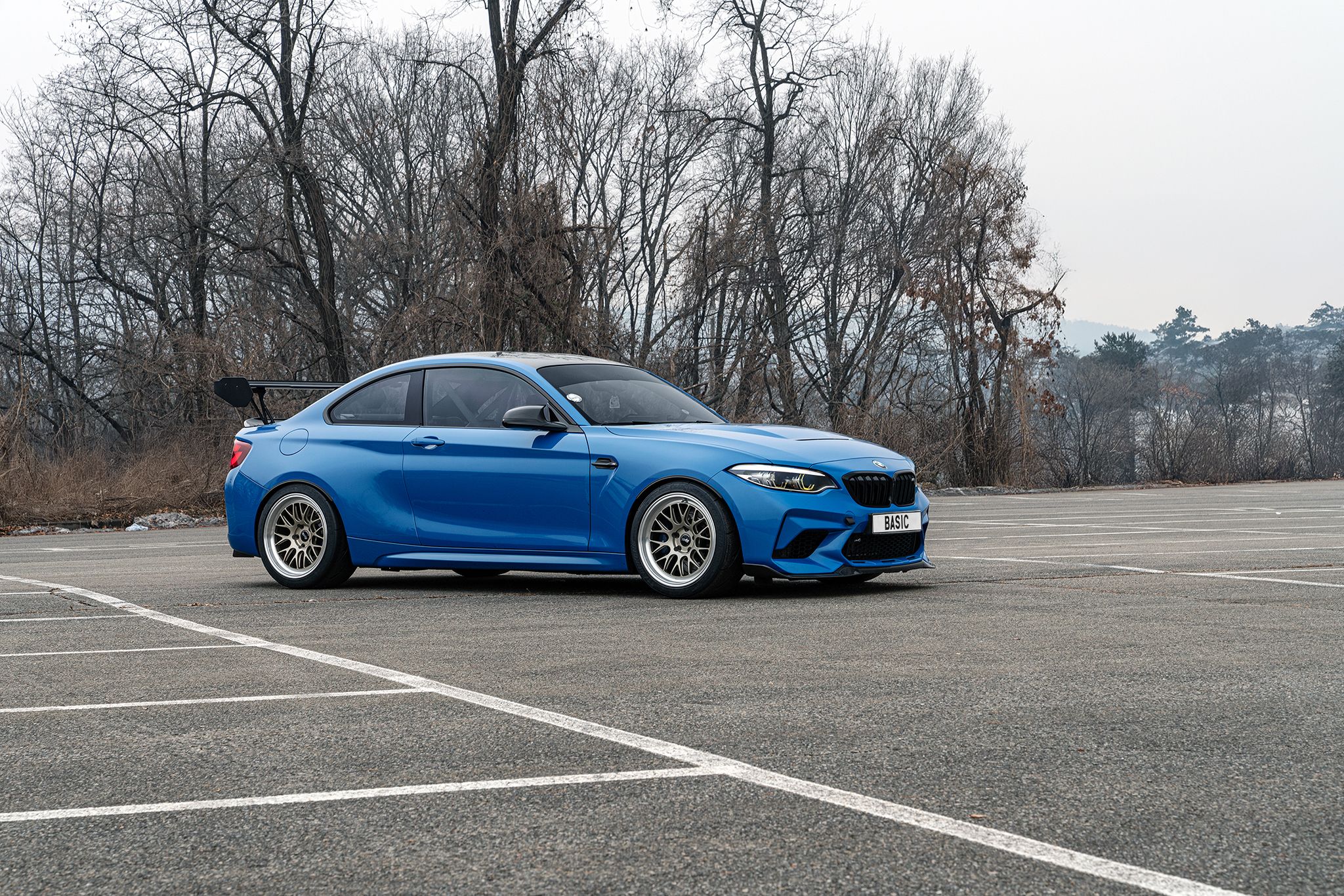 Blue BMW F87 M2 with 18" ML-10RT Apex wheels in Machined Lip Gloss Motorsport Gold
