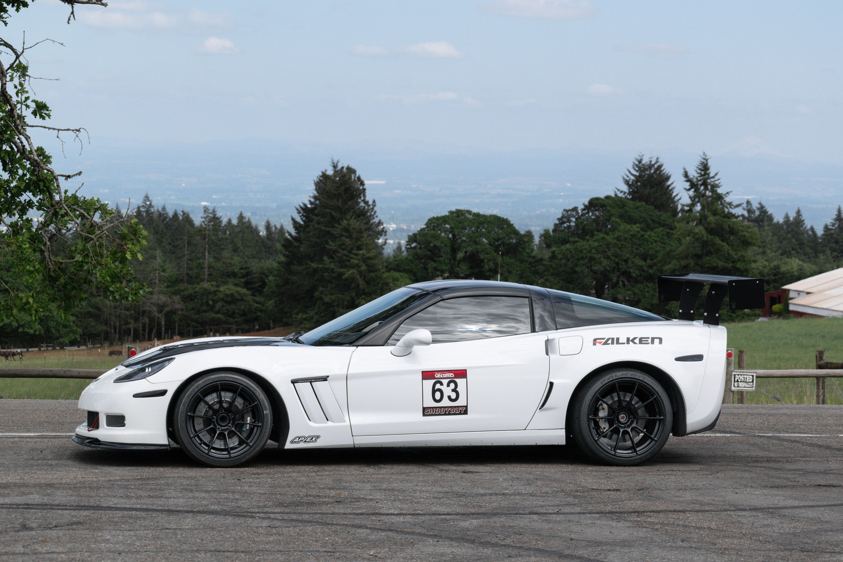 White Chevrolet C6 Corvette Grand Sport with 18"/19" SM-10RS Apex wheels in Satin Black