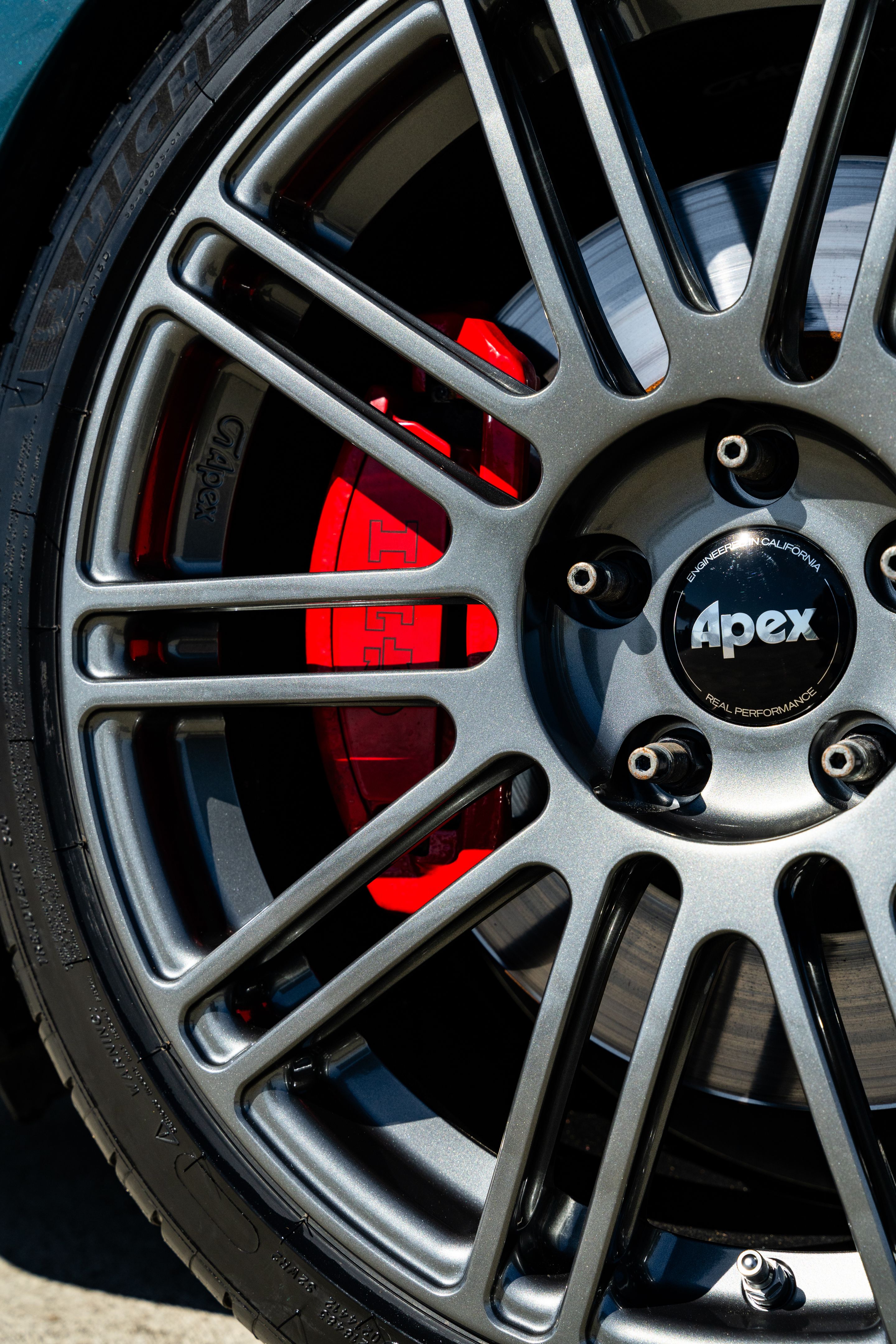 Green VW MK7 GTI with 18" TC-10RT Apex wheels in Anthracite