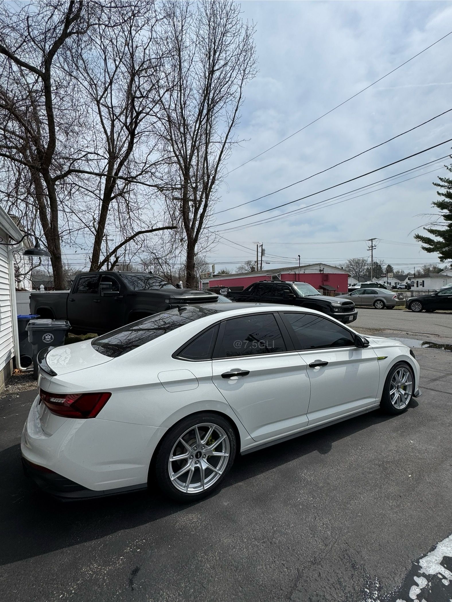 White VW MK7 GLI with 18" VS-5 Apex wheels in Race Silver