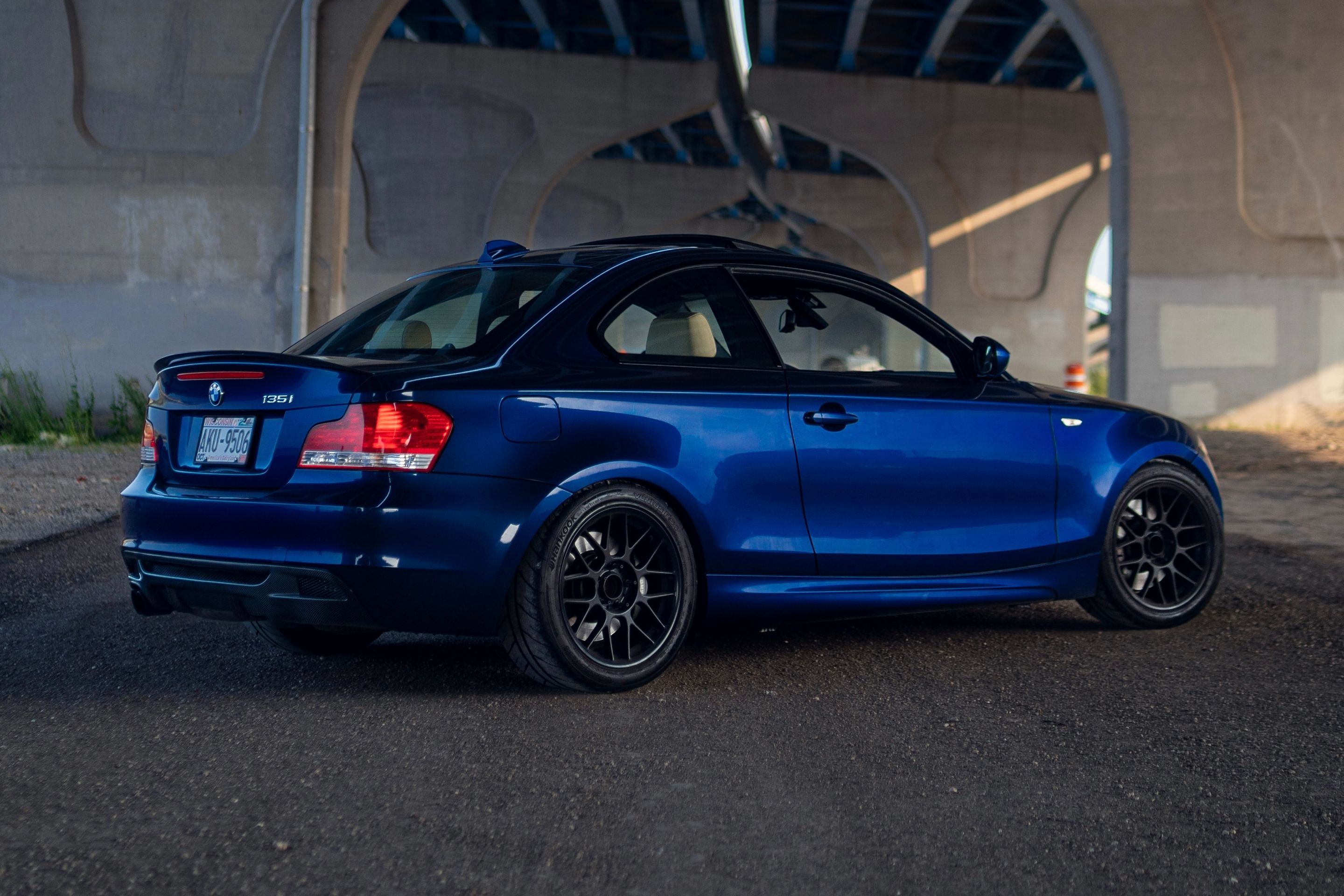 Blue BMW E82 Coupe 1 Series with 17" ARC-8 Apex wheels in Satin Black