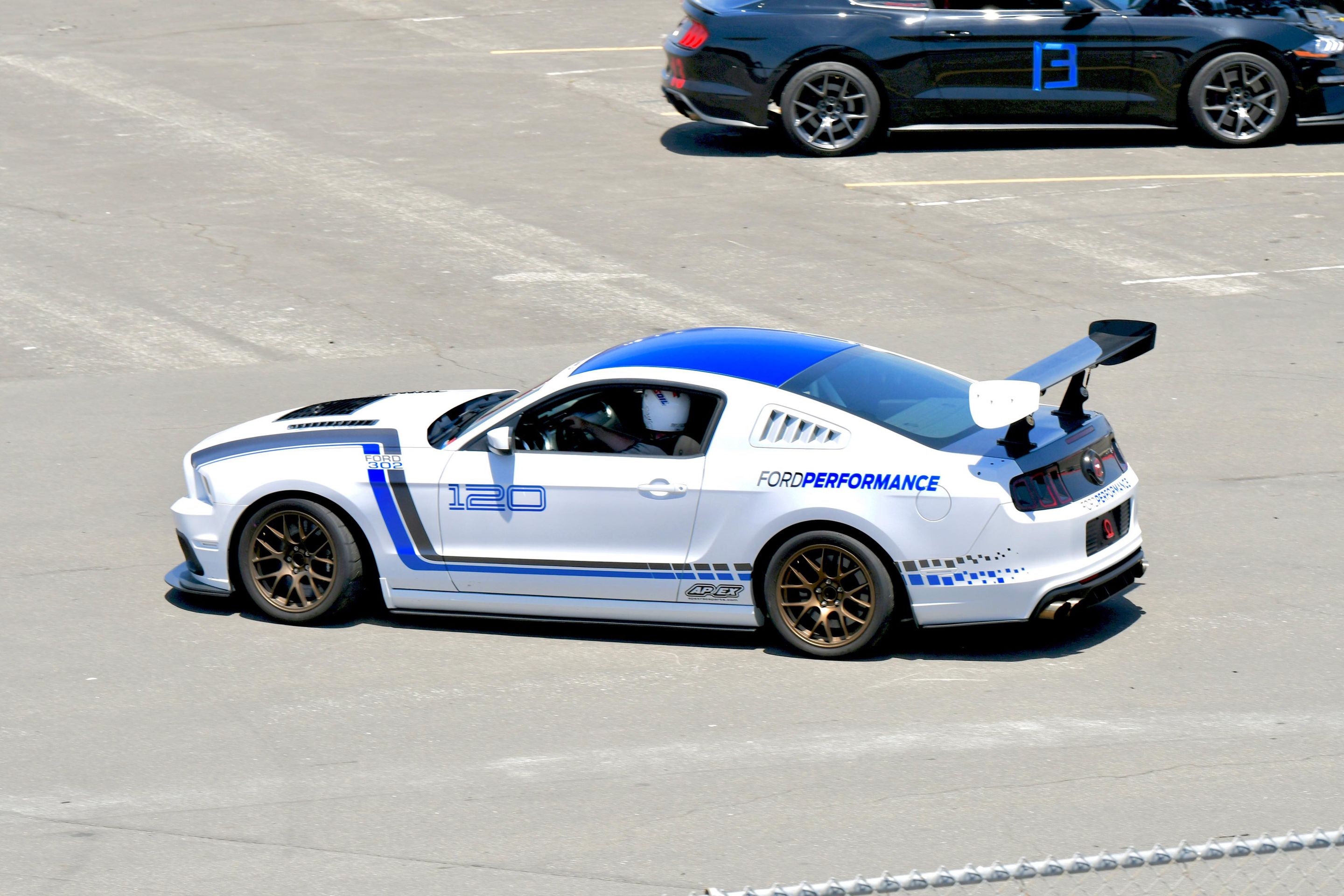 White Ford S197 Mustang GT with 18" EC-7 Apex wheels in Satin Bronze