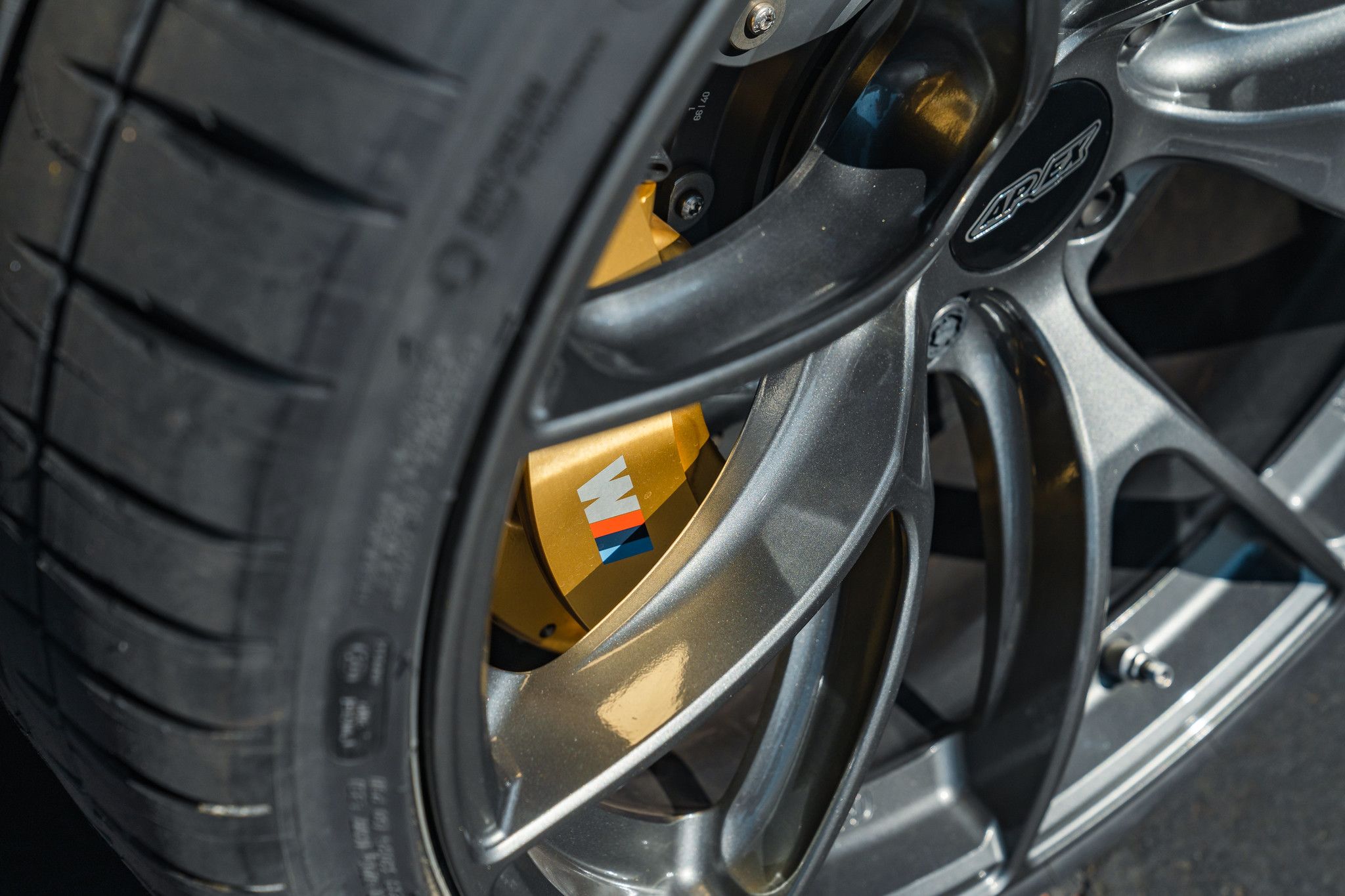 Red BMW F82 Coupe M4 with 19" VS-5RS Apex wheels in Anthracite