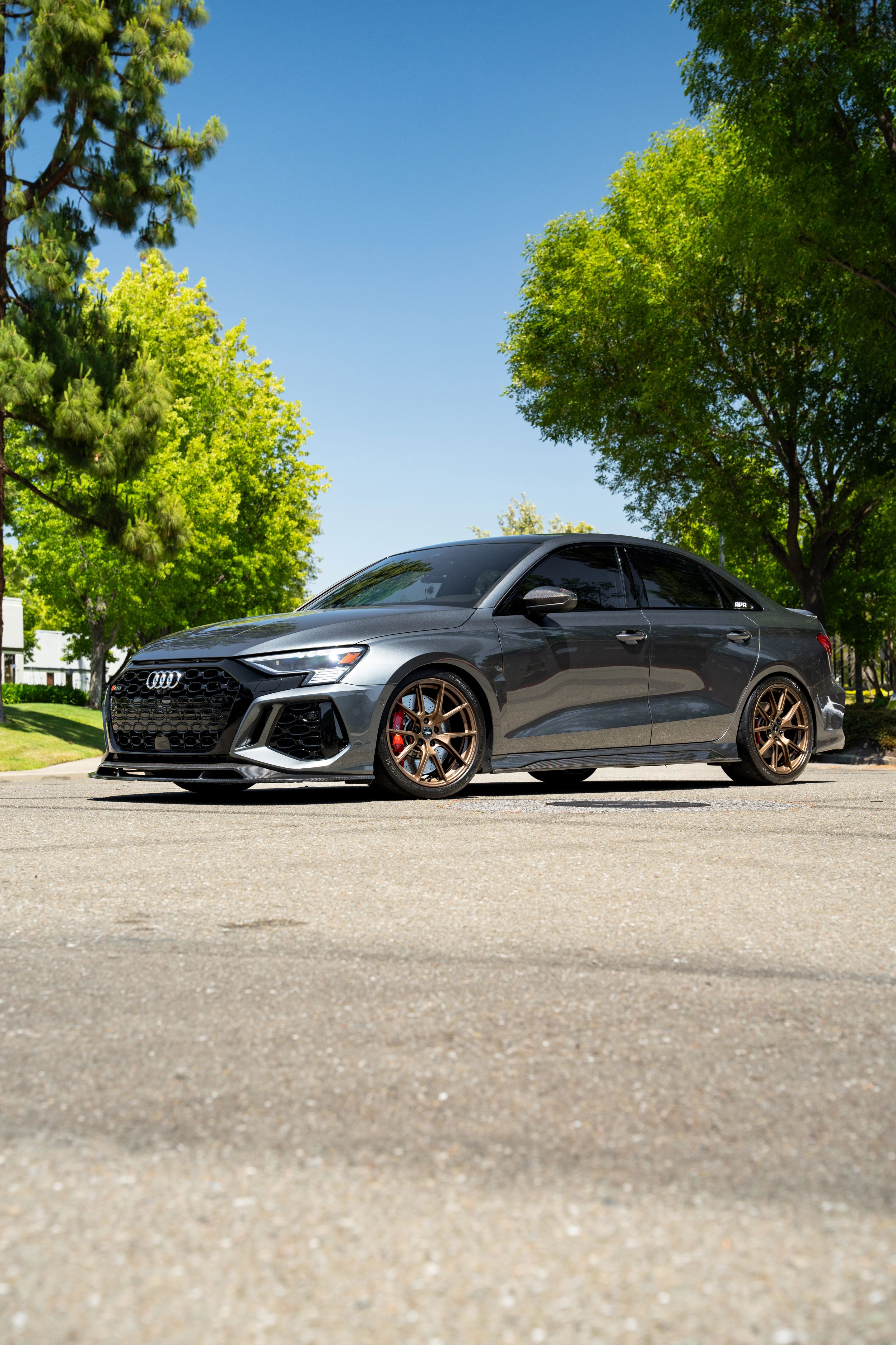 Grey Audi 8Y RS 3 with 18" VS-5 Apex wheels in Satin Bronze