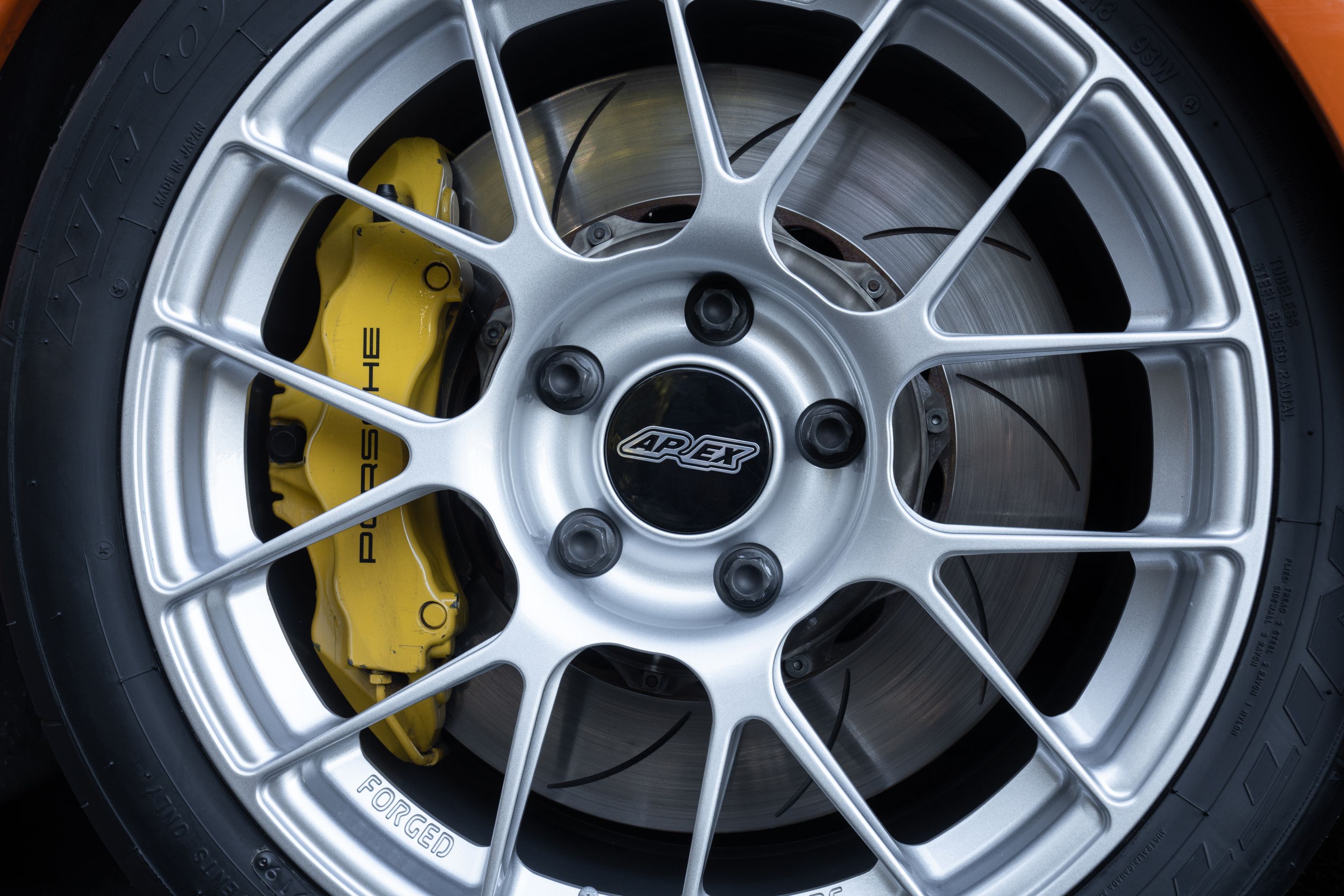 Orange Porsche 911 997 GT3 RS with 18" EC-7RS Apex wheels in Race Silver