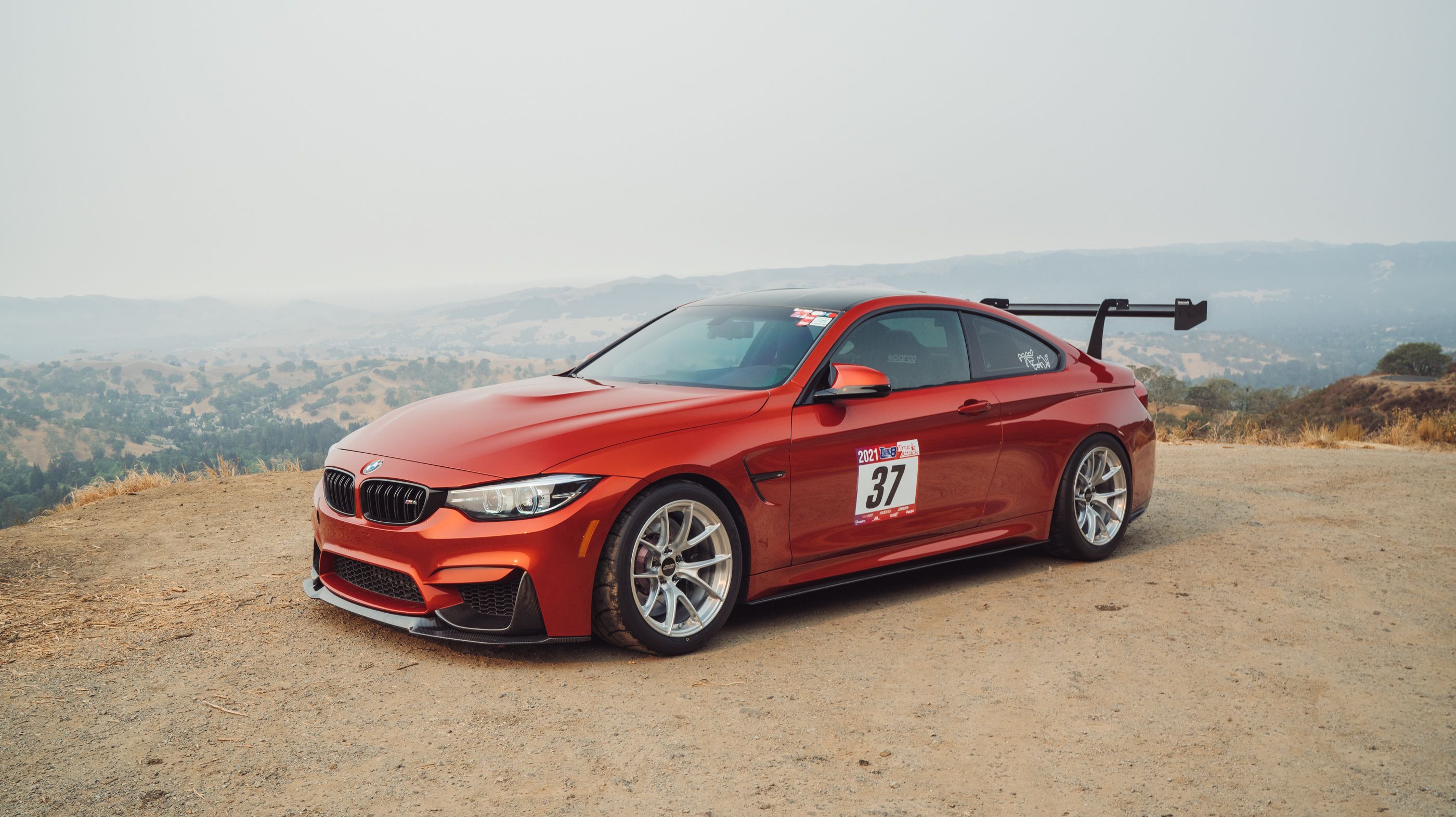 Orange BMW F82 Coupe M4 with 18" VS-5RS Apex wheels in Brushed Clear