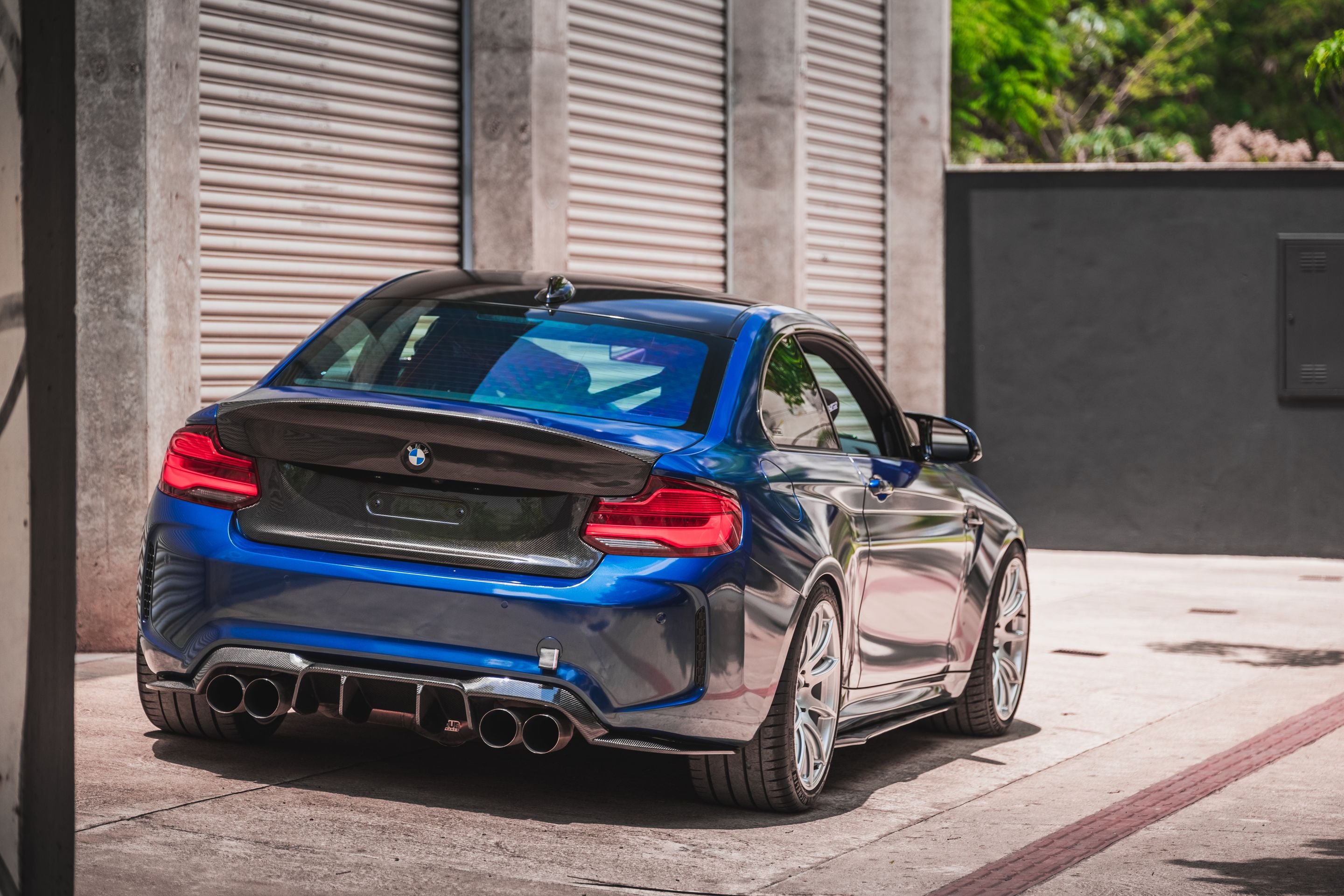 Blue BMW F87 M2 with 19" SM-10 Apex wheels in Race Silver