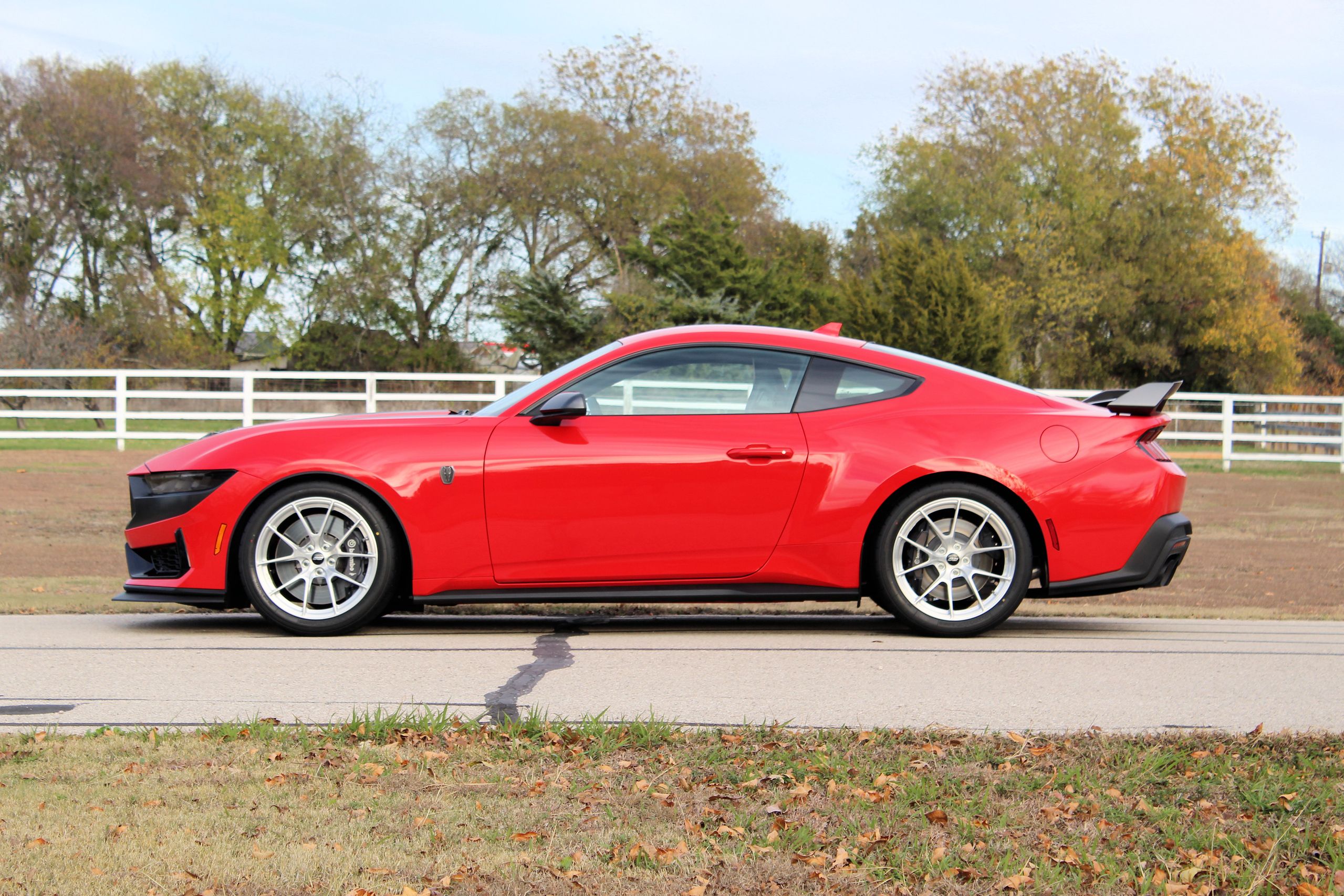 Red Ford S650 Mustang Dark Horse with 19" VS-5RS Apex wheels in Brushed Clear