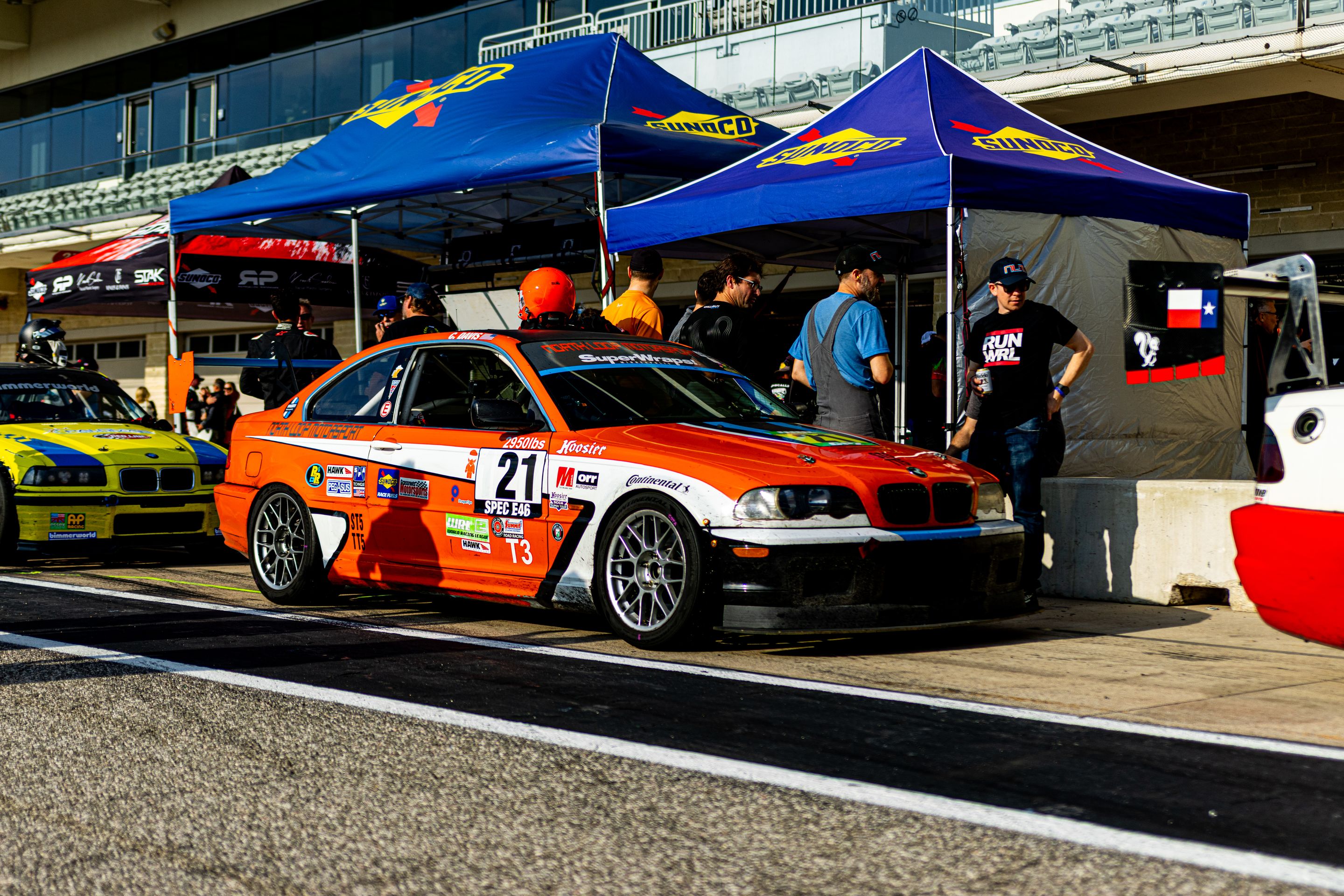 Orange BMW Spec E46 with 17" ARC-8 Apex wheels in Hyper Black