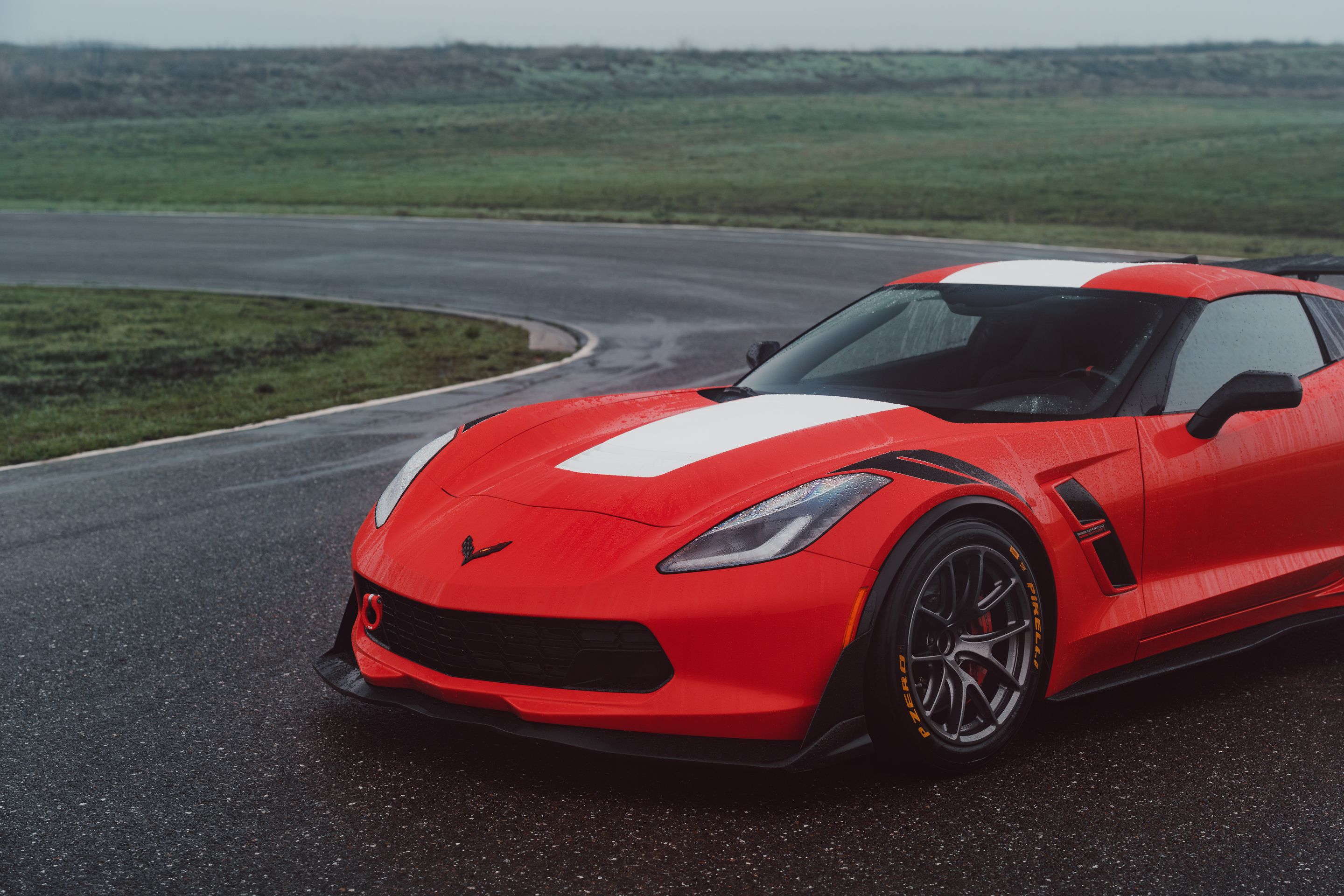 Red Chevrolet C7 Corvette Grand Sport with 18" VS-5RE Apex wheels in Anthracite