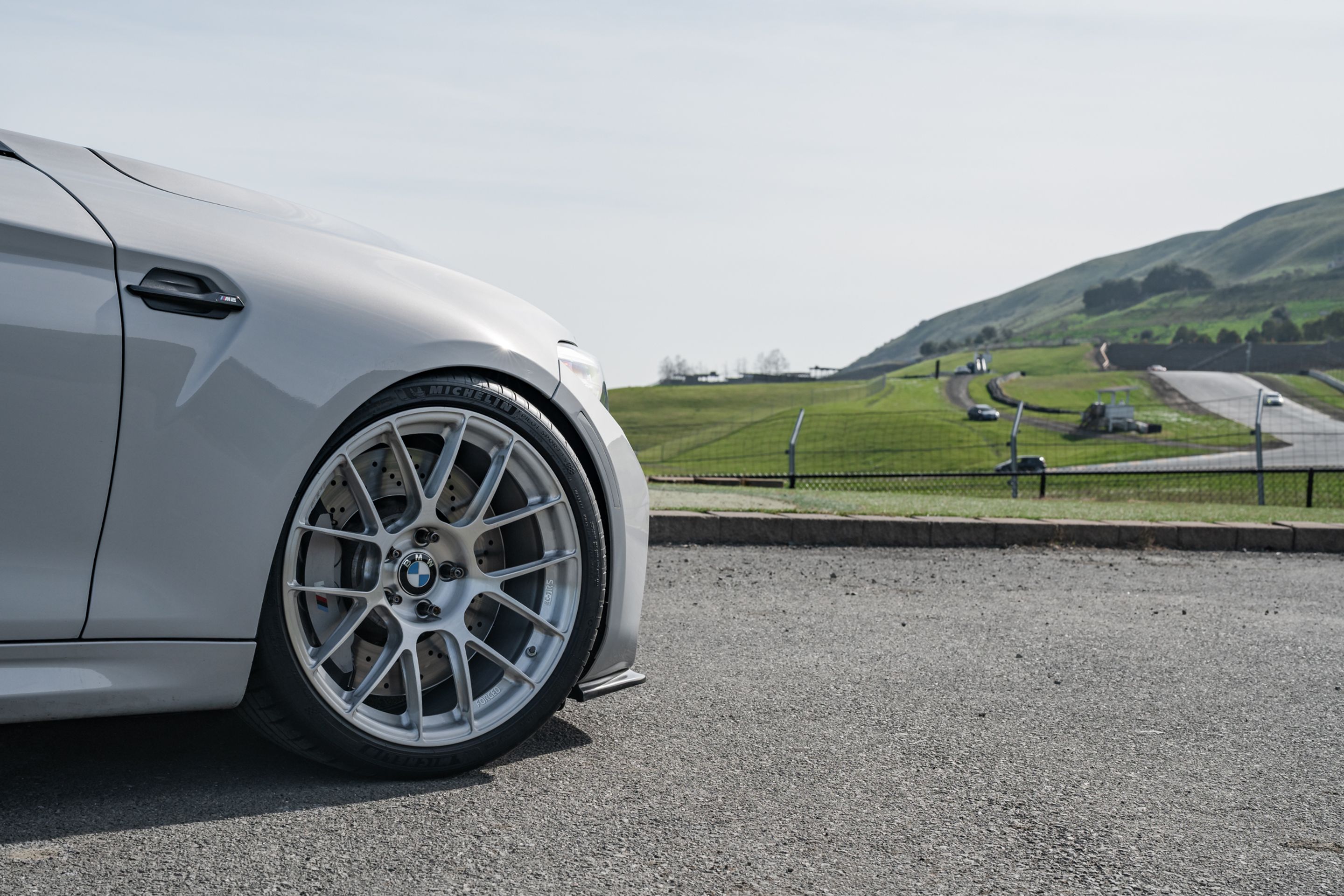 Silver BMW F87 M2 with 19" EC-7RS Apex wheels in Brushed Clear