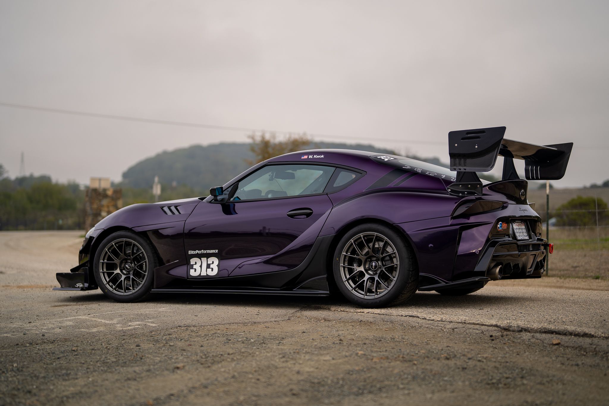 Purple Toyota GR Supra with 18" EC-7RS Apex wheels in Anthracite