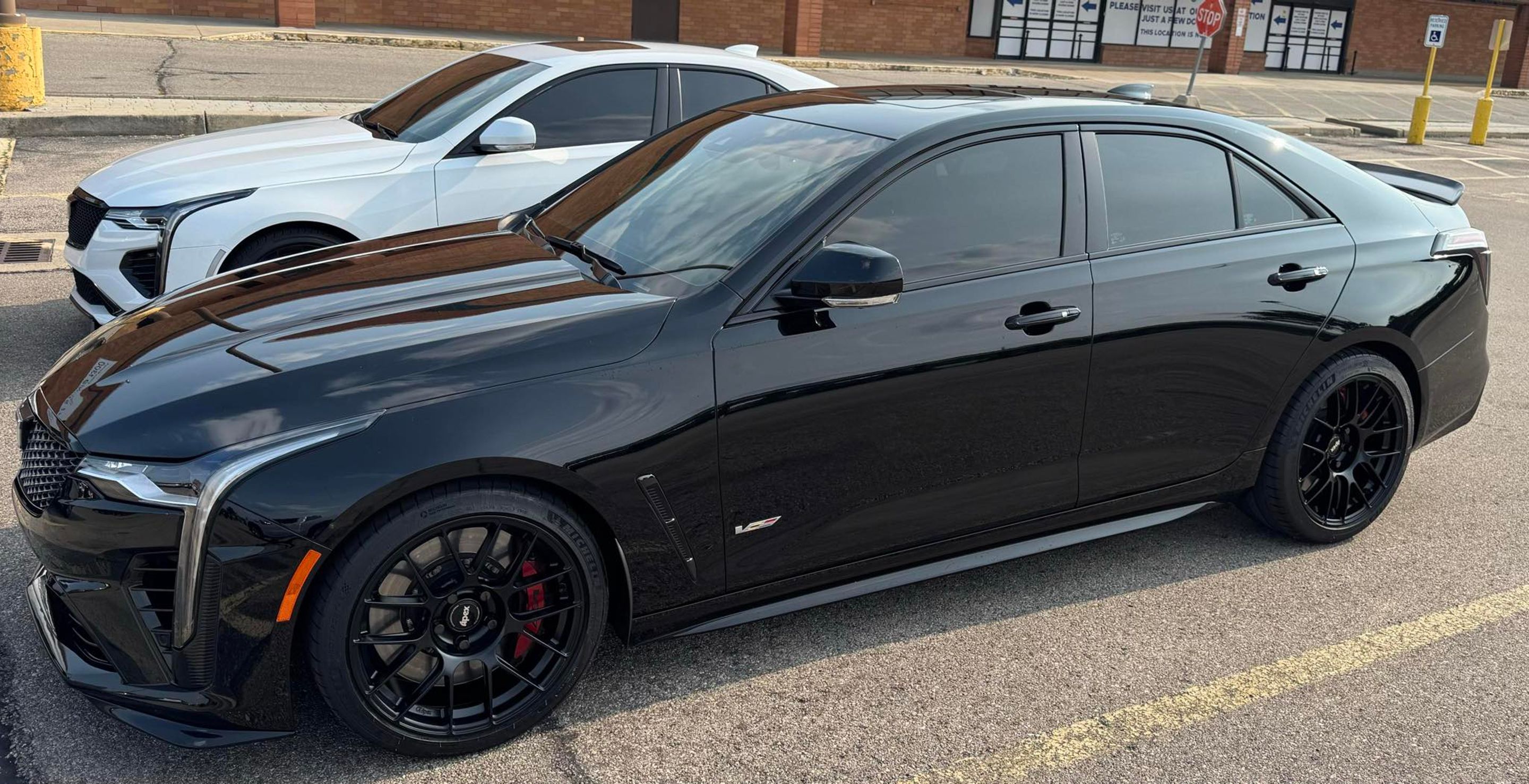 Black Cadillac CT4-V Blackwing with 18" EC-7RS Apex wheels in Satin Black