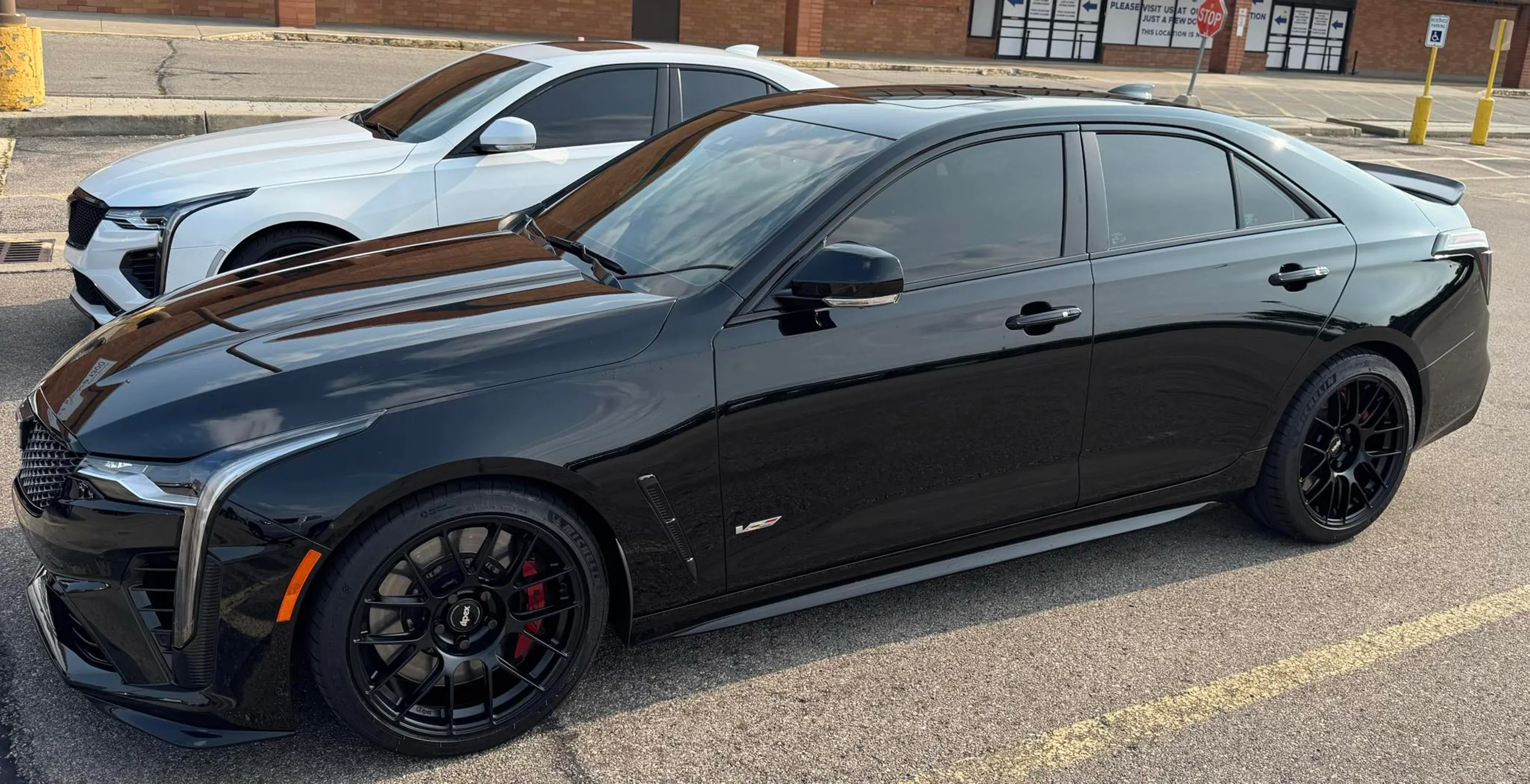 Black Cadillac CT4-V Blackwing with 18" EC-7 Apex wheels in Satin Black
