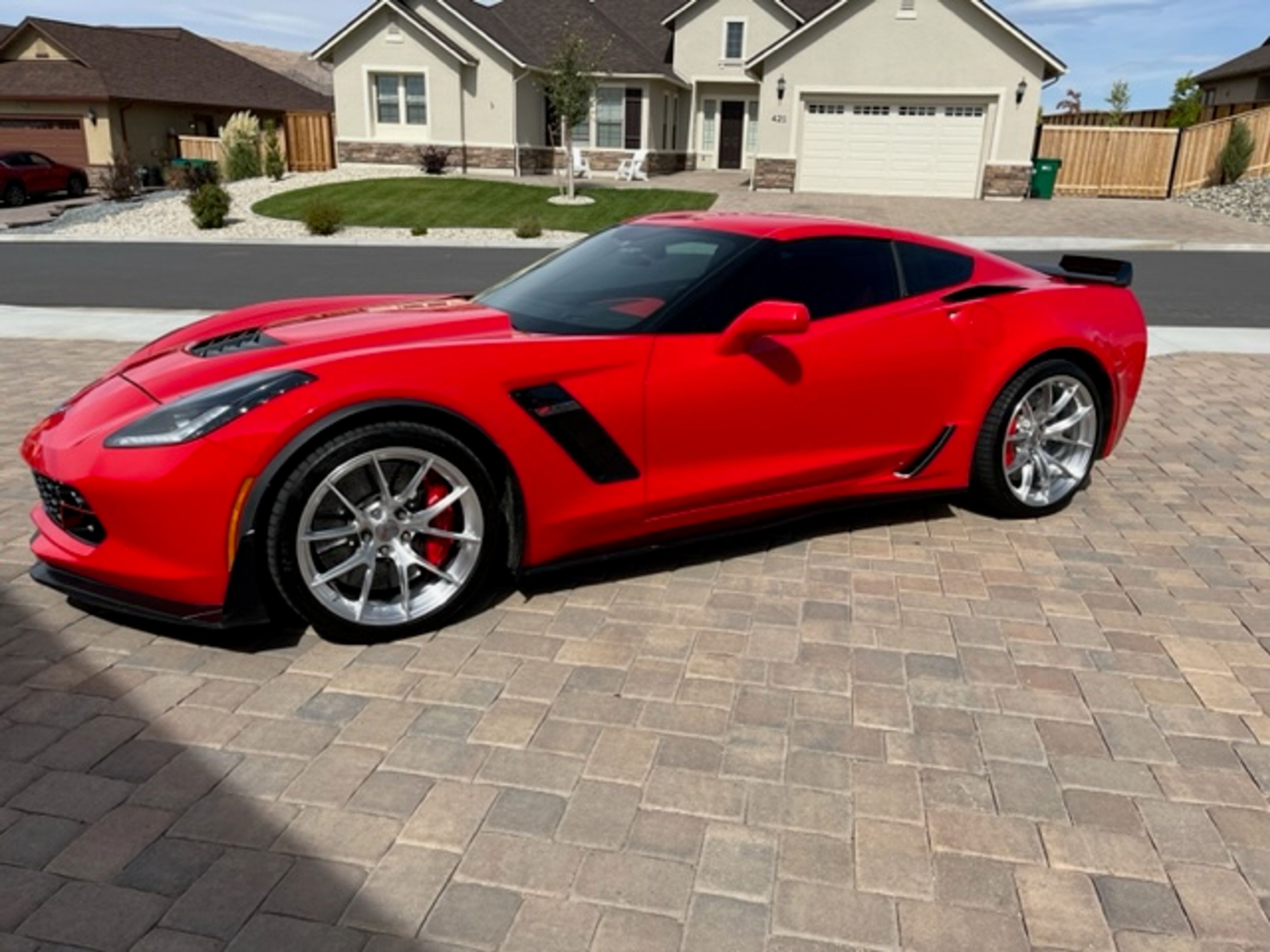Red Chevrolet C7 Corvette Z06 with 19"/20" VS-5RS Apex wheels in Brushed Clear