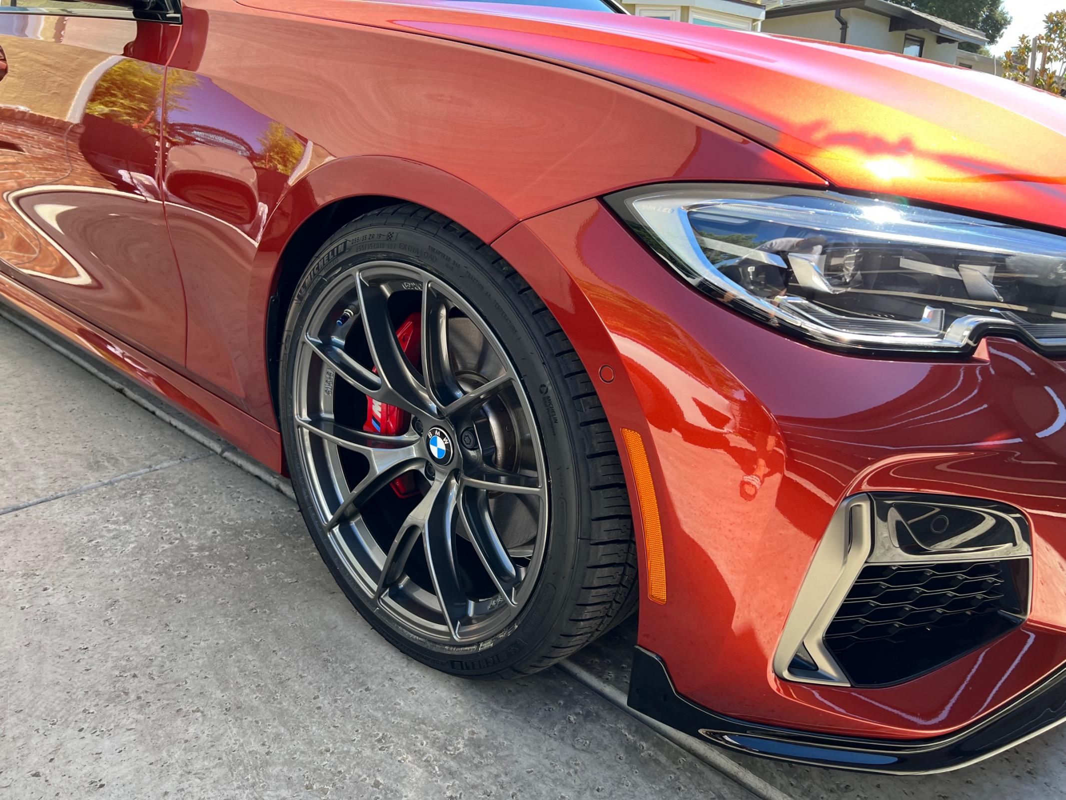 Orange BMW G20 Sedan 3 Series with 19" VS-5RS Apex wheels in Anthracite