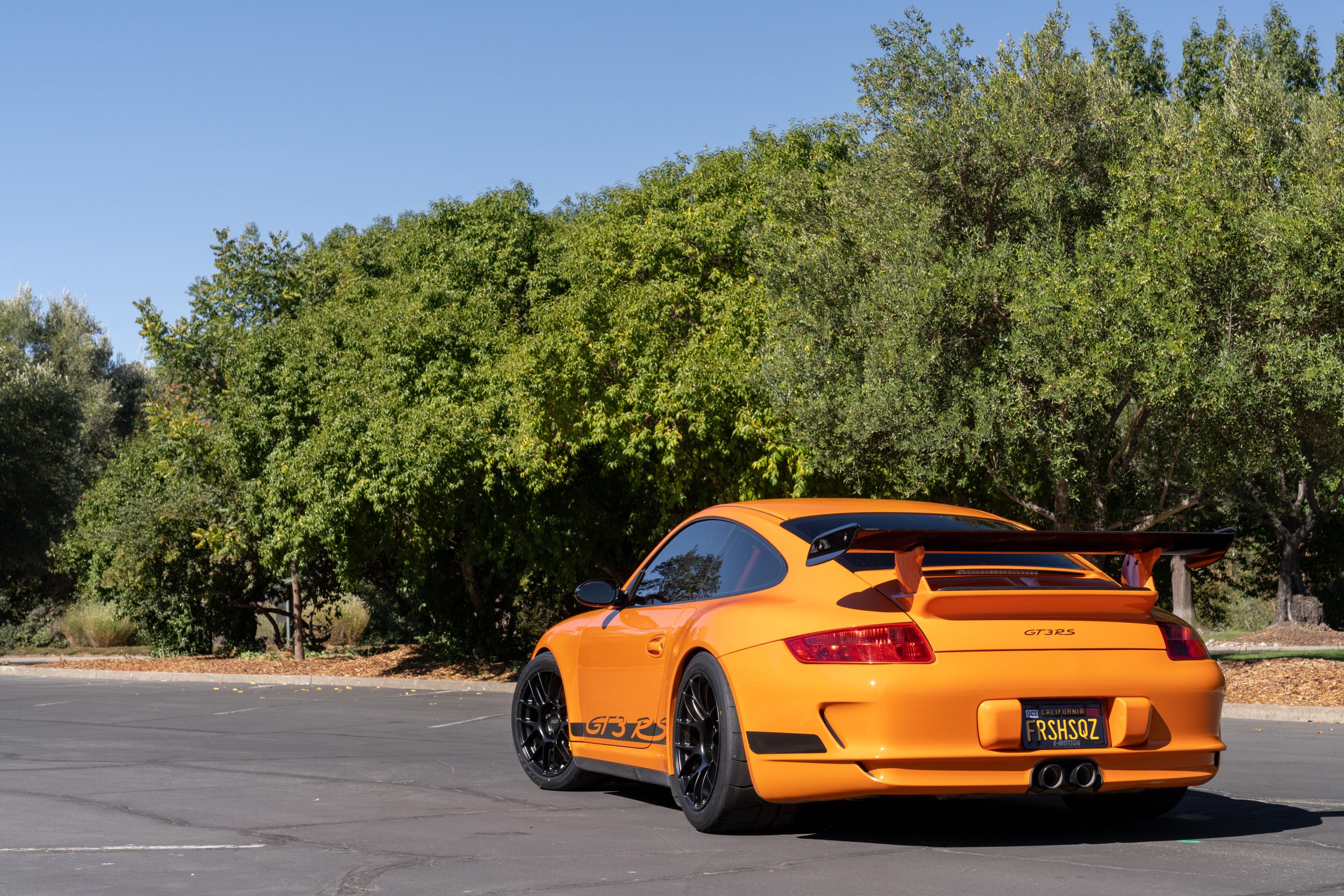 Orange Porsche 911 997 GT3 RS with 18" EC-7RS Apex wheels in Satin Black