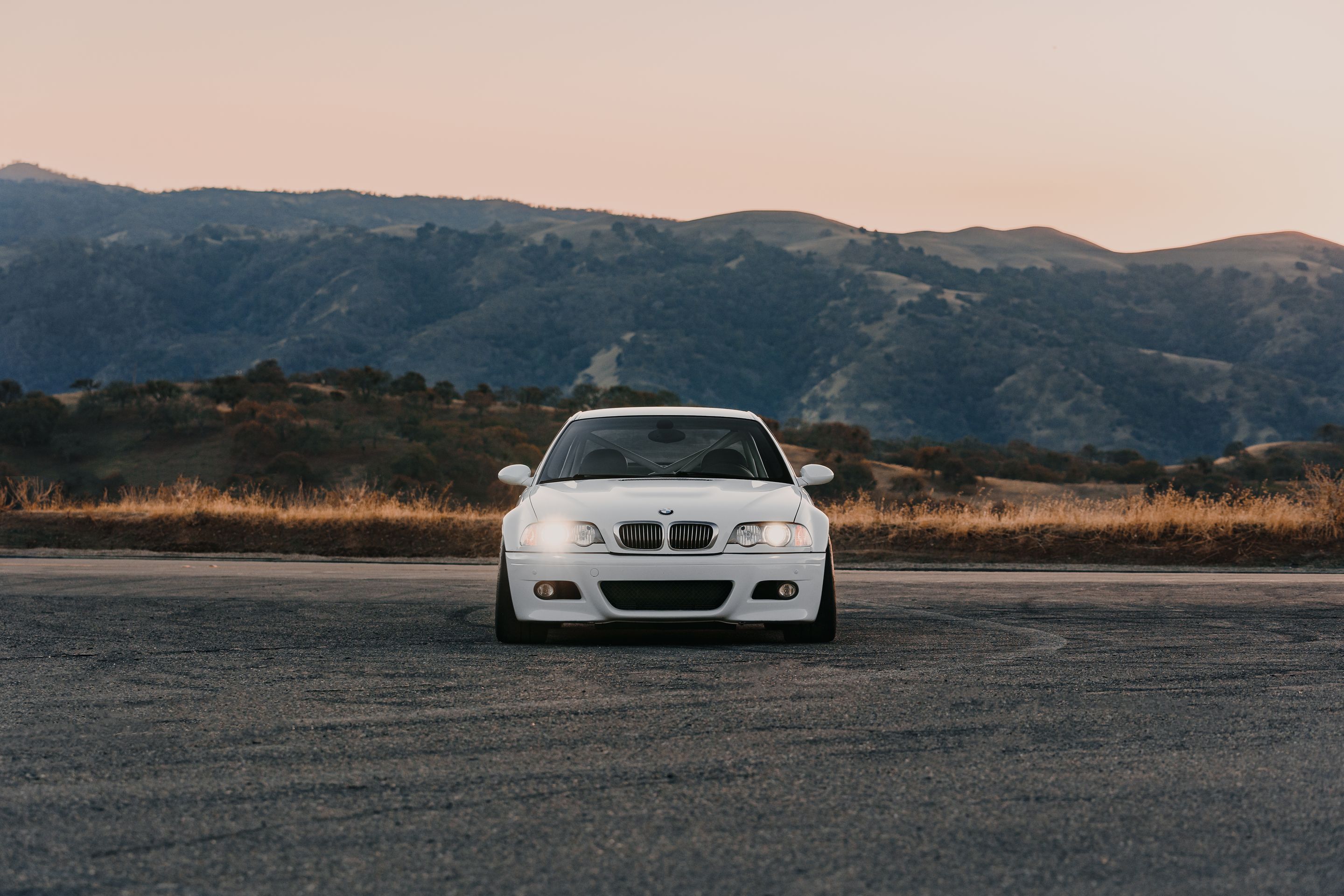 White BMW E46 M3 with 18" EC-7 Apex wheels in Race Silver