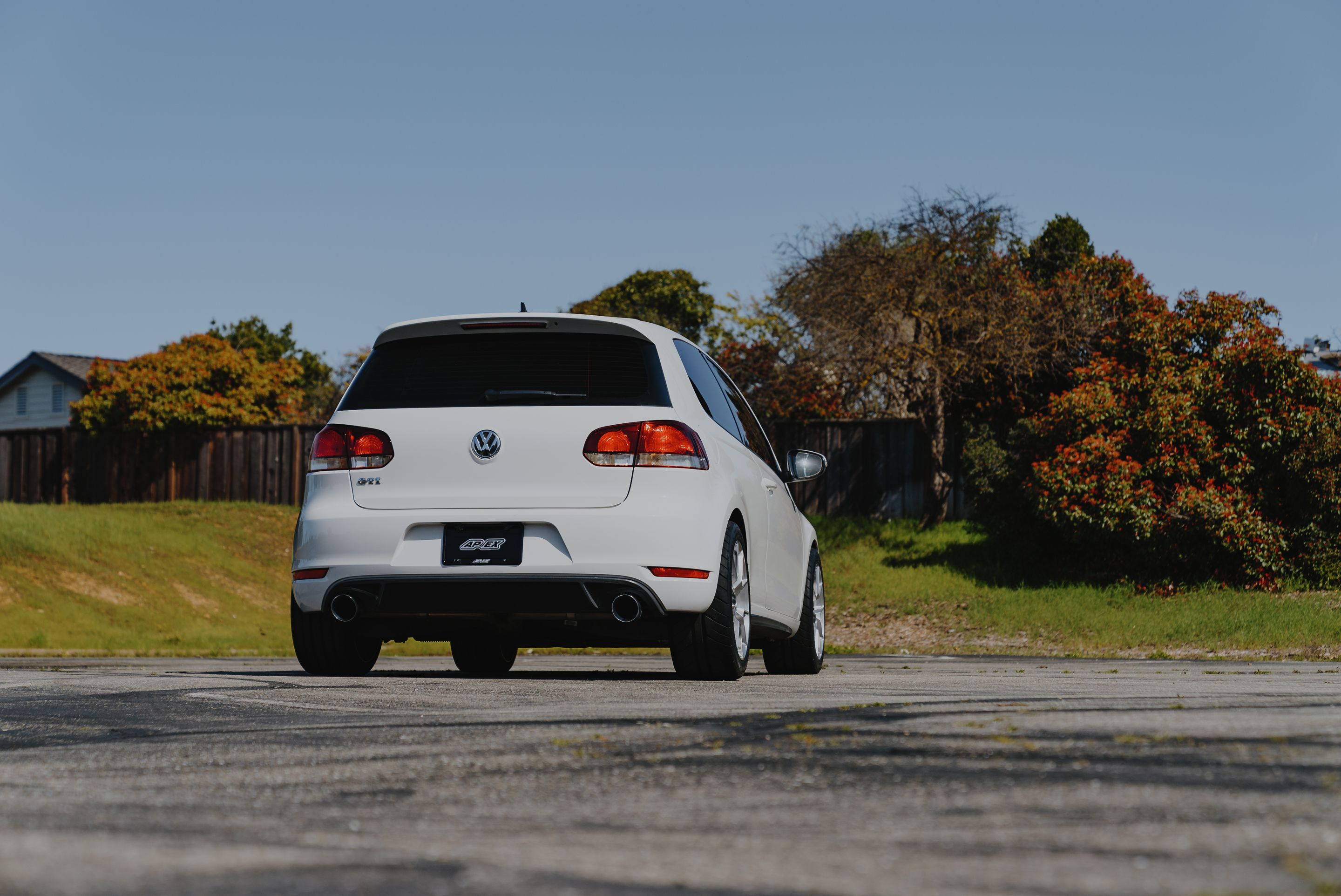 White VW MK6 GTI with 17" VS-5RS Apex wheels in Brushed Clear