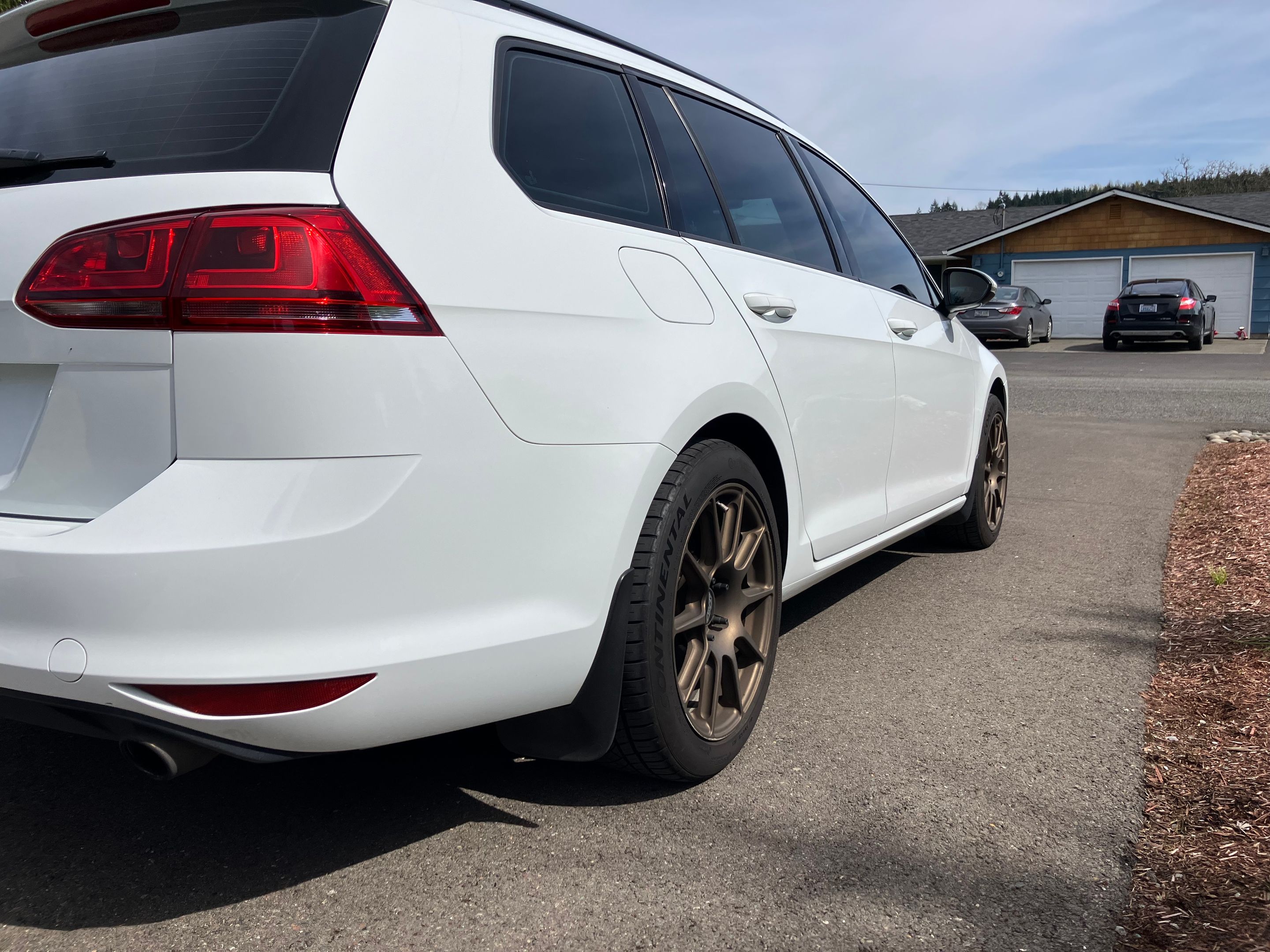 White VW MK7 Alltrack/SportWagen Golf SportWagen with 17" VS-5 Apex wheels in Satin Bronze